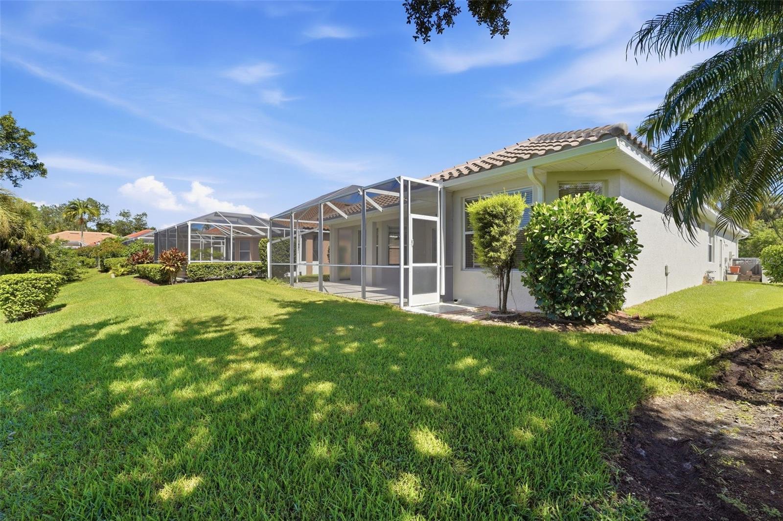Back yard very private and wooded behind the lot greenbelt area! - 5301 LAUREL OAK CT, NORTH PORT