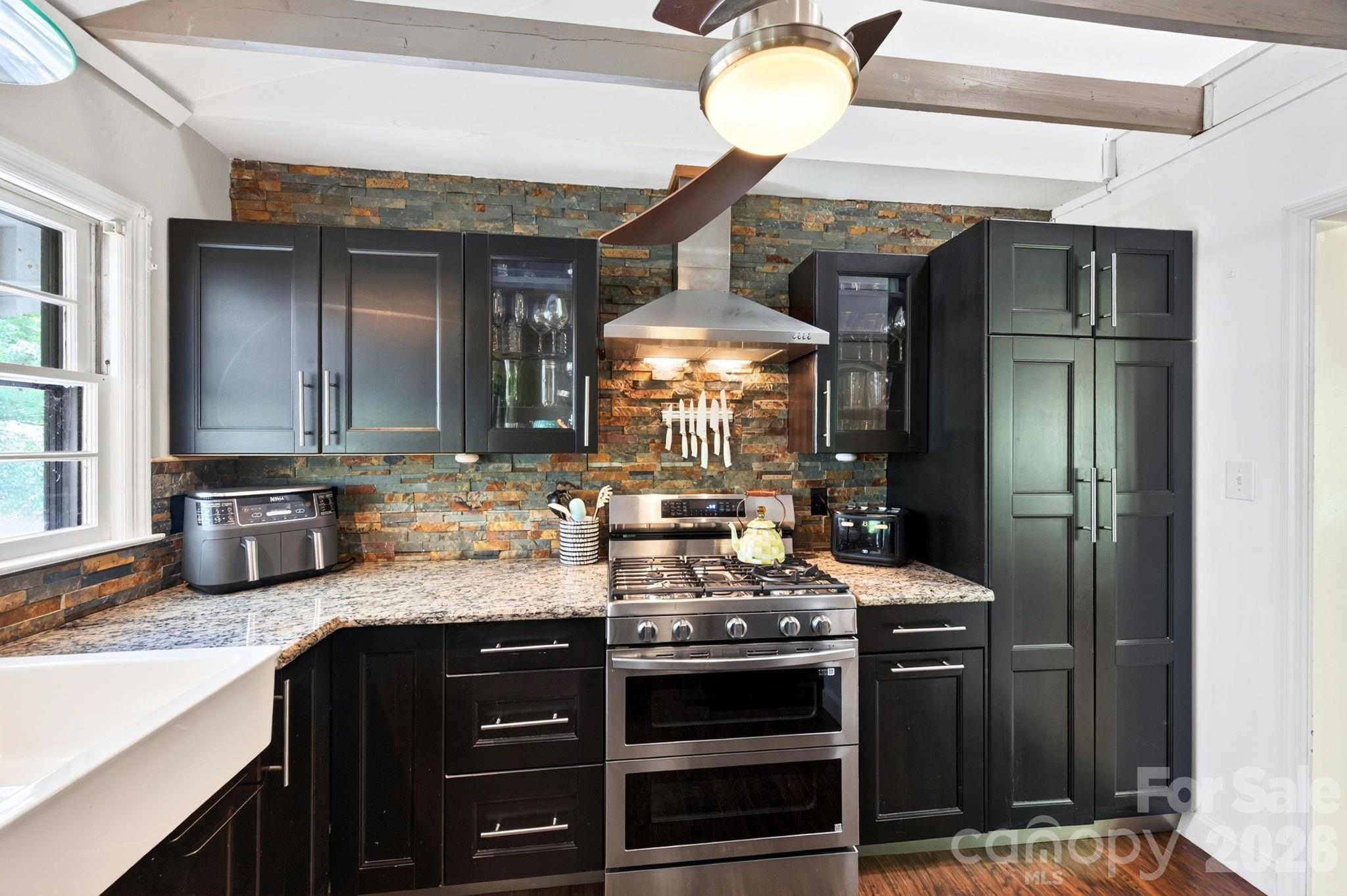 Updated cooks kitchen with a gas range with double oven - 109 Wilshire Drive, Asheville