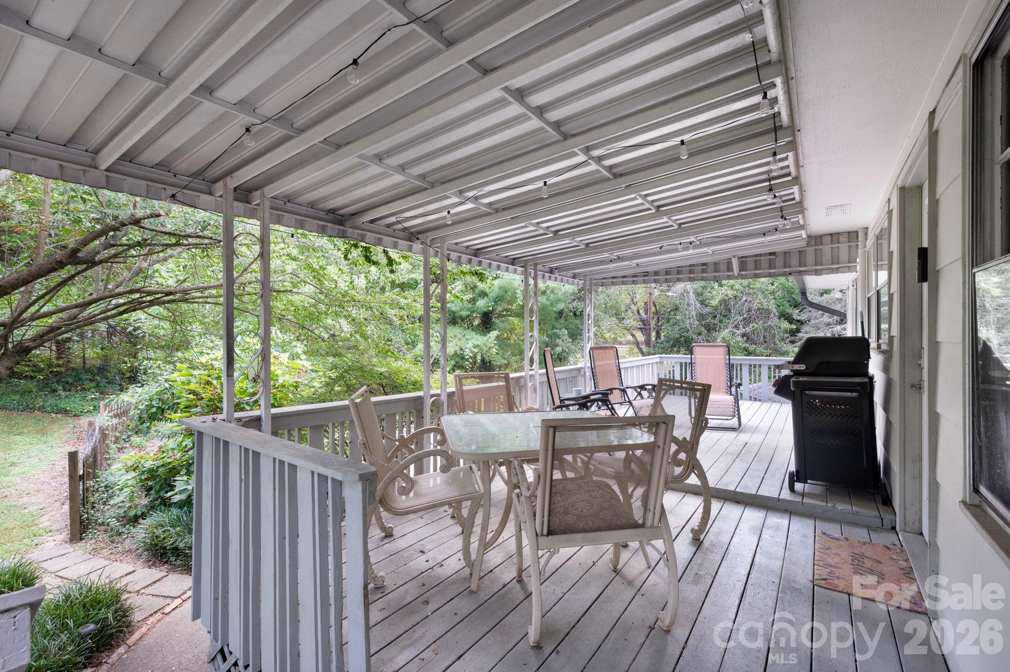 Large partially covered deck for dining, lounging and entertaining - 109 Wilshire Drive, Asheville