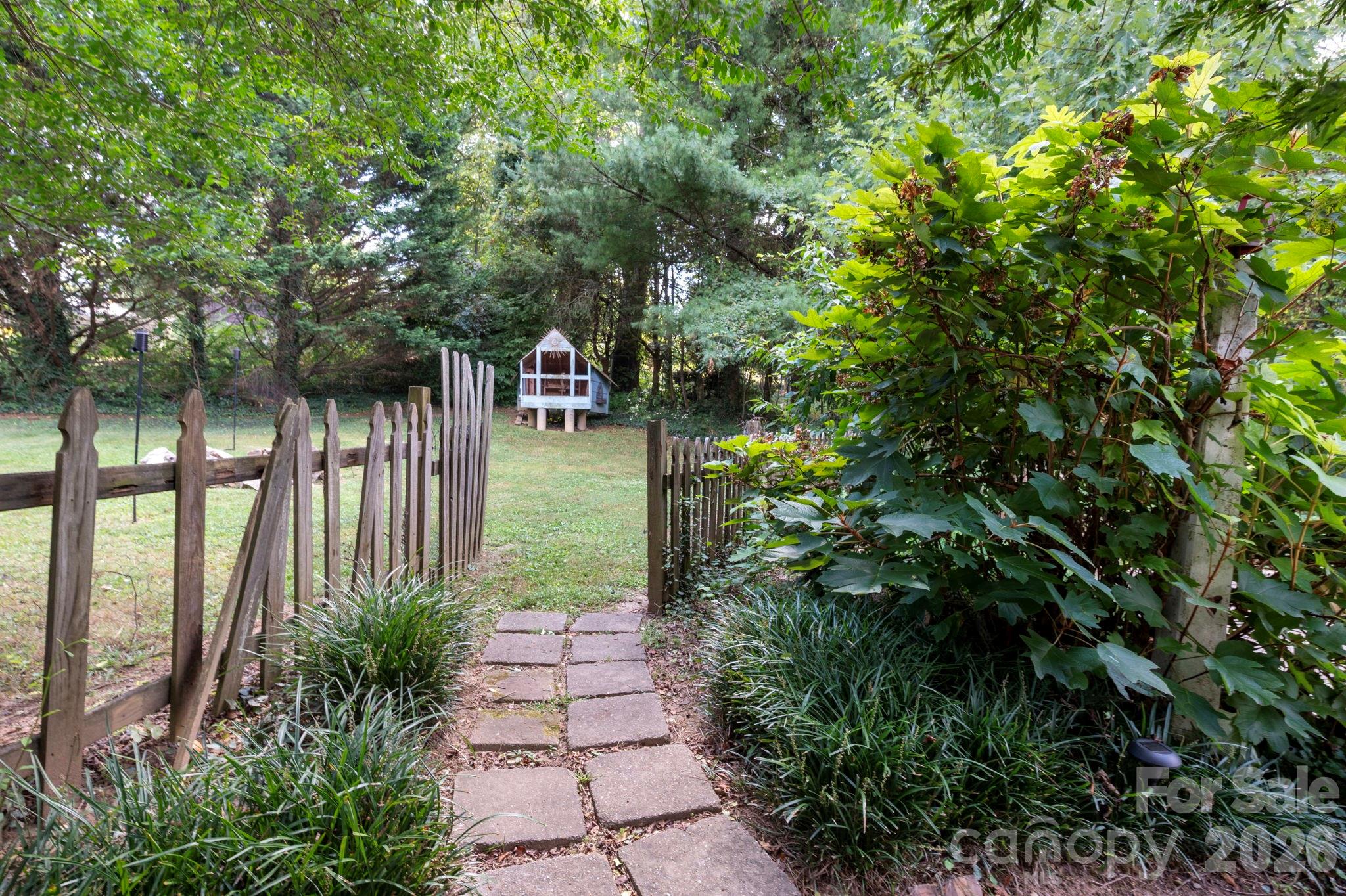 Mature landscaping and established trees offering greenery and privacy - 109 Wilshire Drive, Asheville