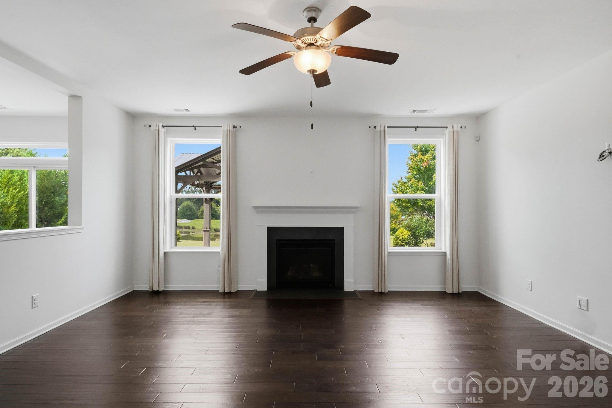 Family Room Overlooking Backyard - 108 Heron Cove Loop, Mooresville