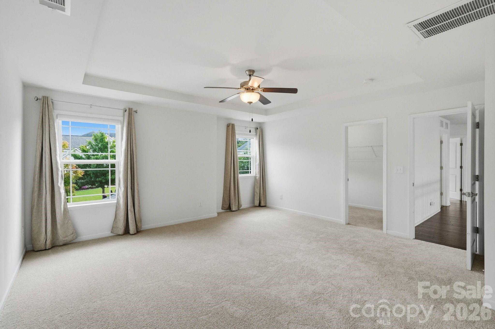 Primary Bedroom filled with natural light - 108 Heron Cove Loop, Mooresville