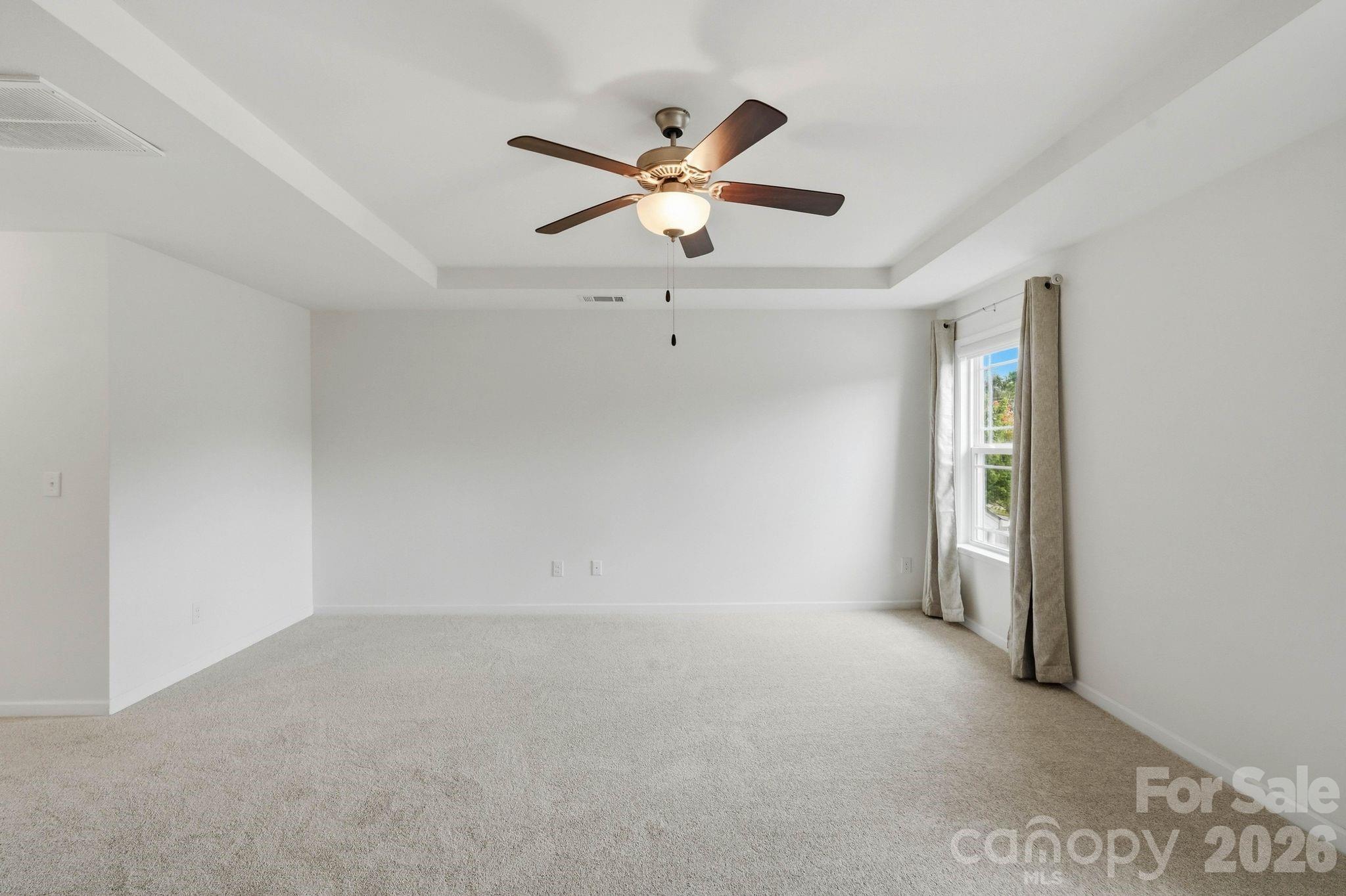 Large open space with ample wall space to anchor furniture - 108 Heron Cove Loop, Mooresville