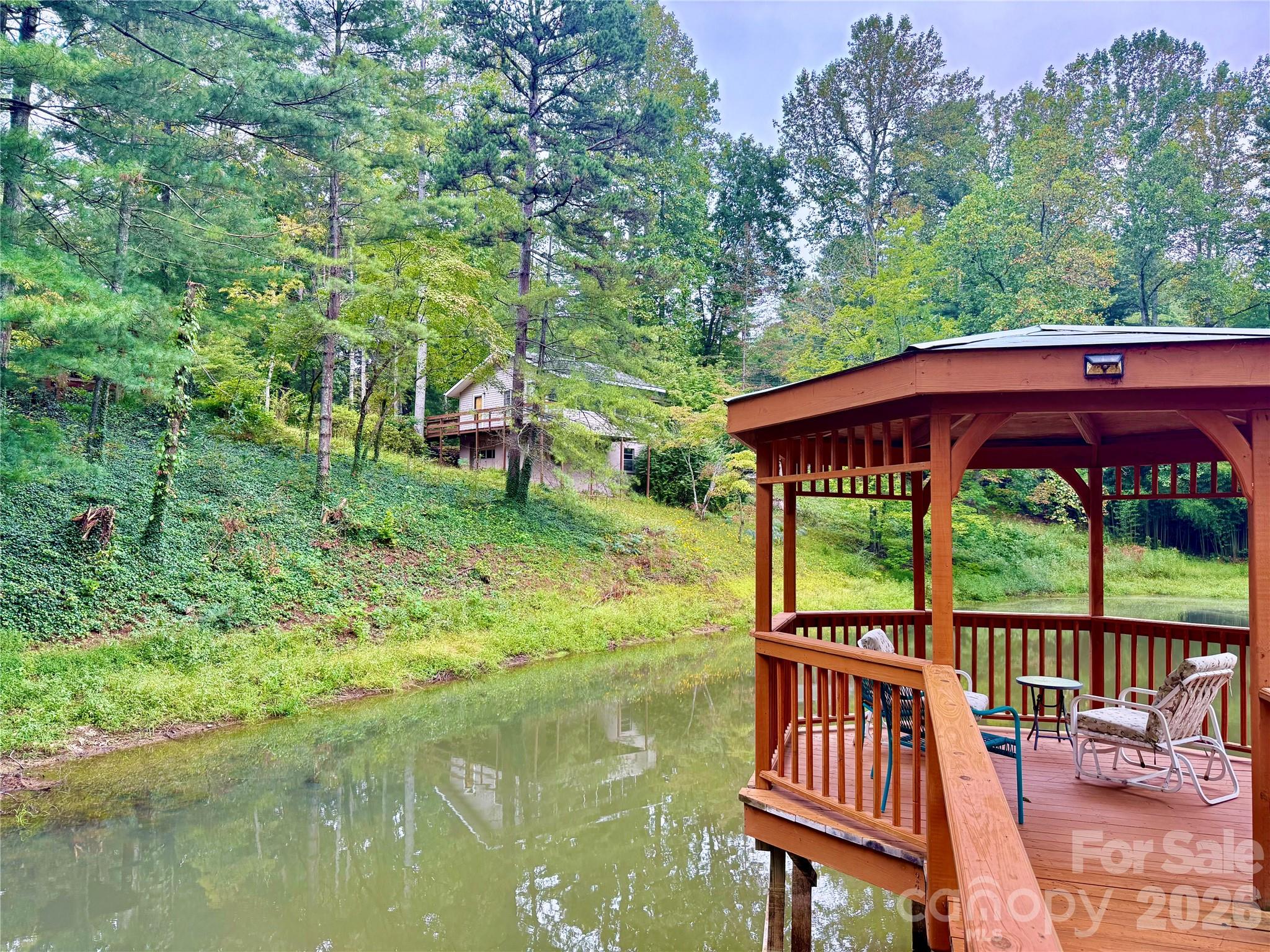 Community Dock with home on hill in picture - 30 Lakemont Cottage Trail, Flat Rock