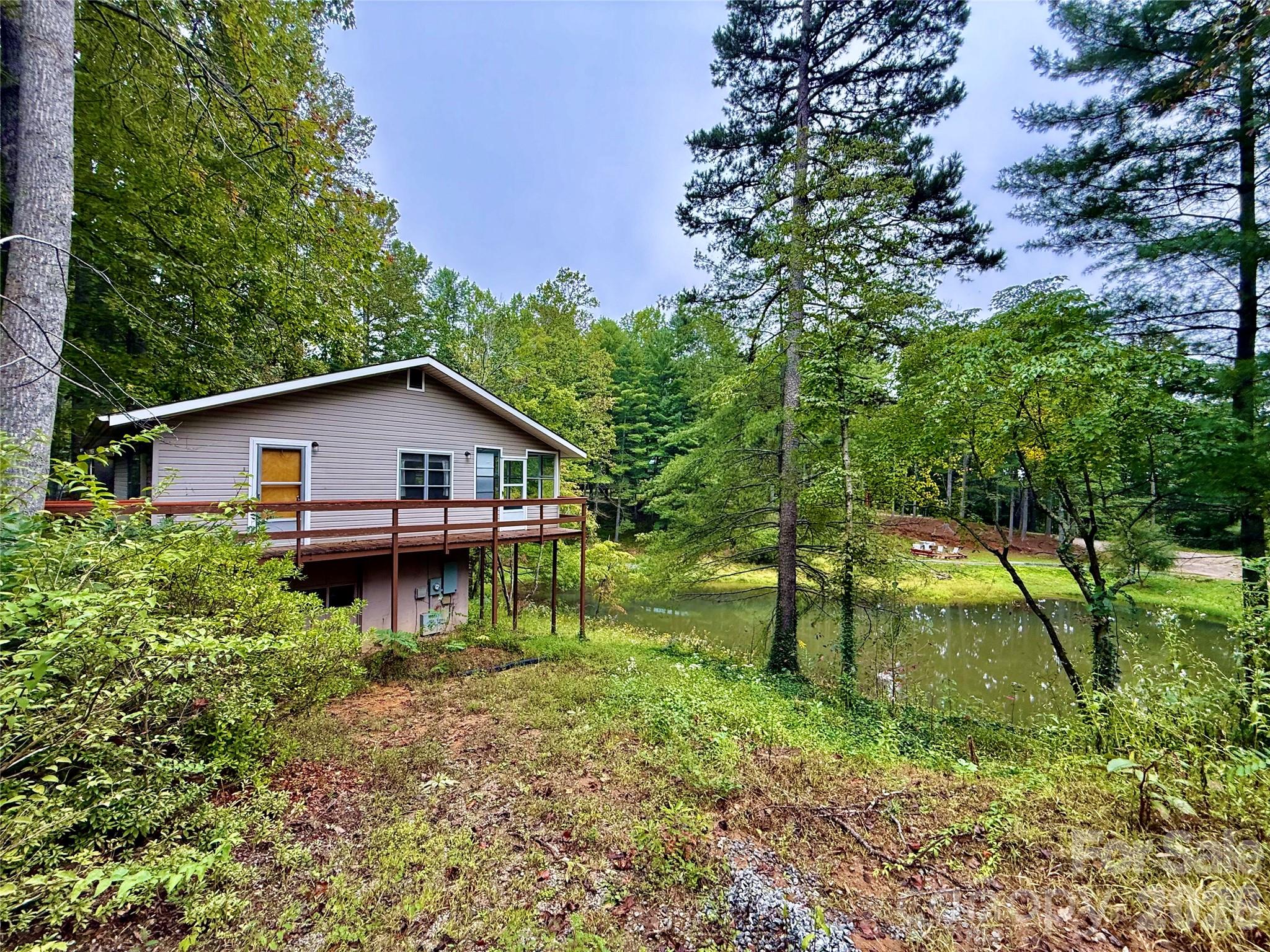 view of home from carport - 30 Lakemont Cottage Trail, Flat Rock