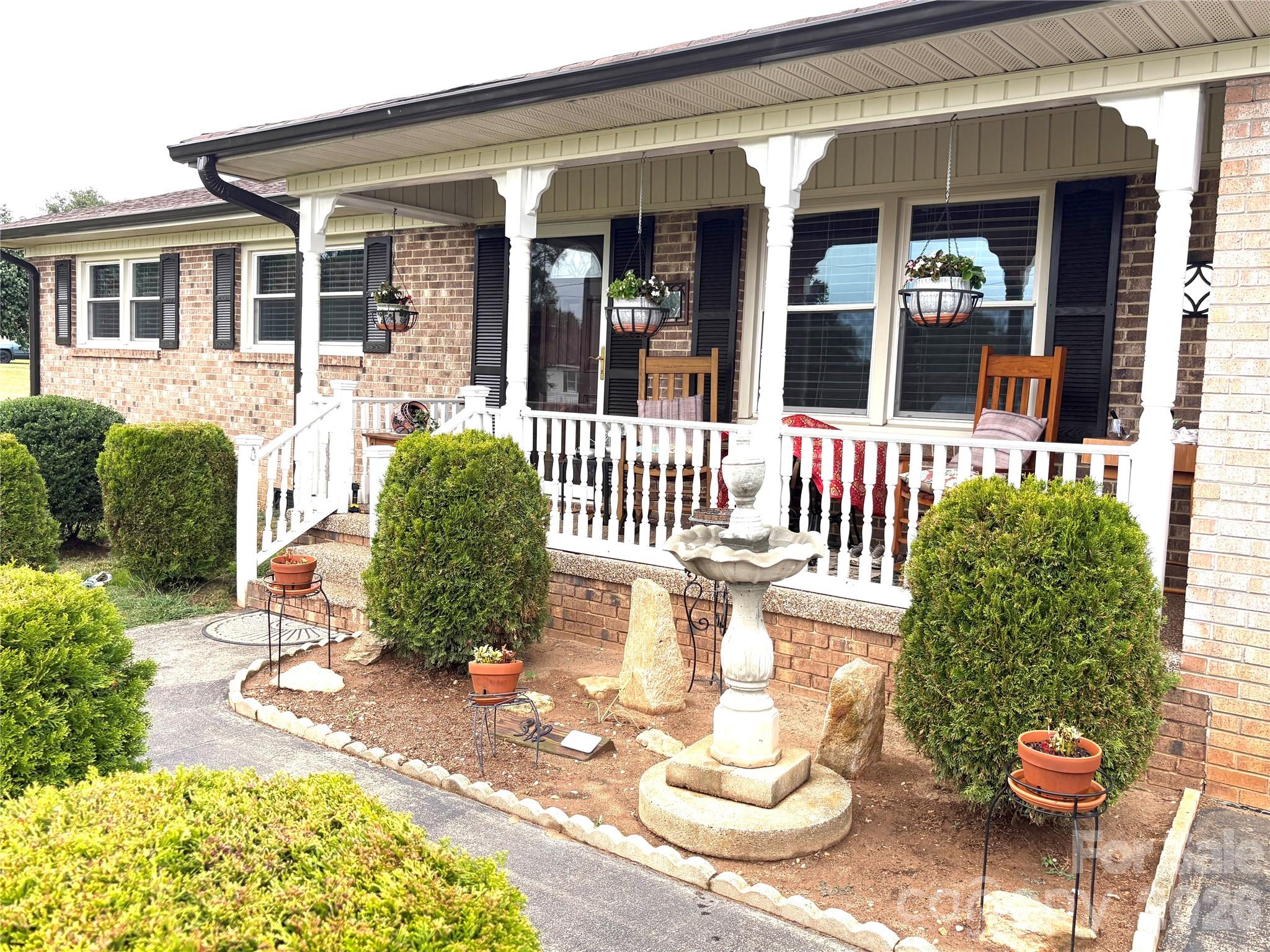 Inviting Covered Country Porch for Community Viewing - 312 Old Belwood Road, Belwood