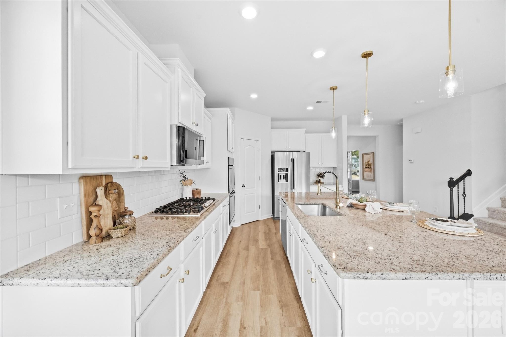 Thoughtful kitchen layout make meal prep and everyday organization easy - 2015 Kensley Drive, Waxhaw