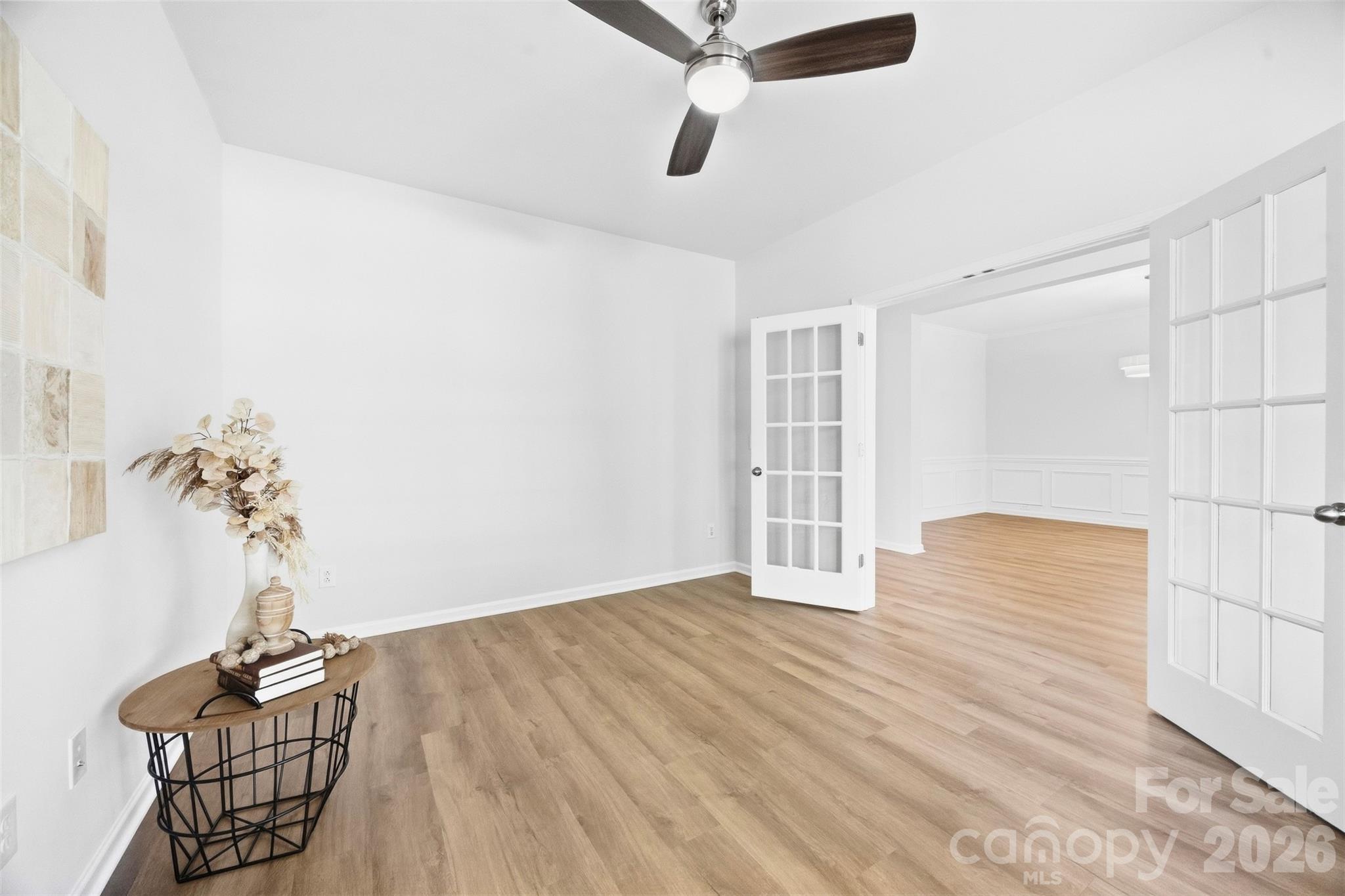 Beautifully refreshed main level features new LVP flooring throughout, fresh paint, and updated lighting for a bright, cohesive look - 2015 Kensley Drive, Waxhaw