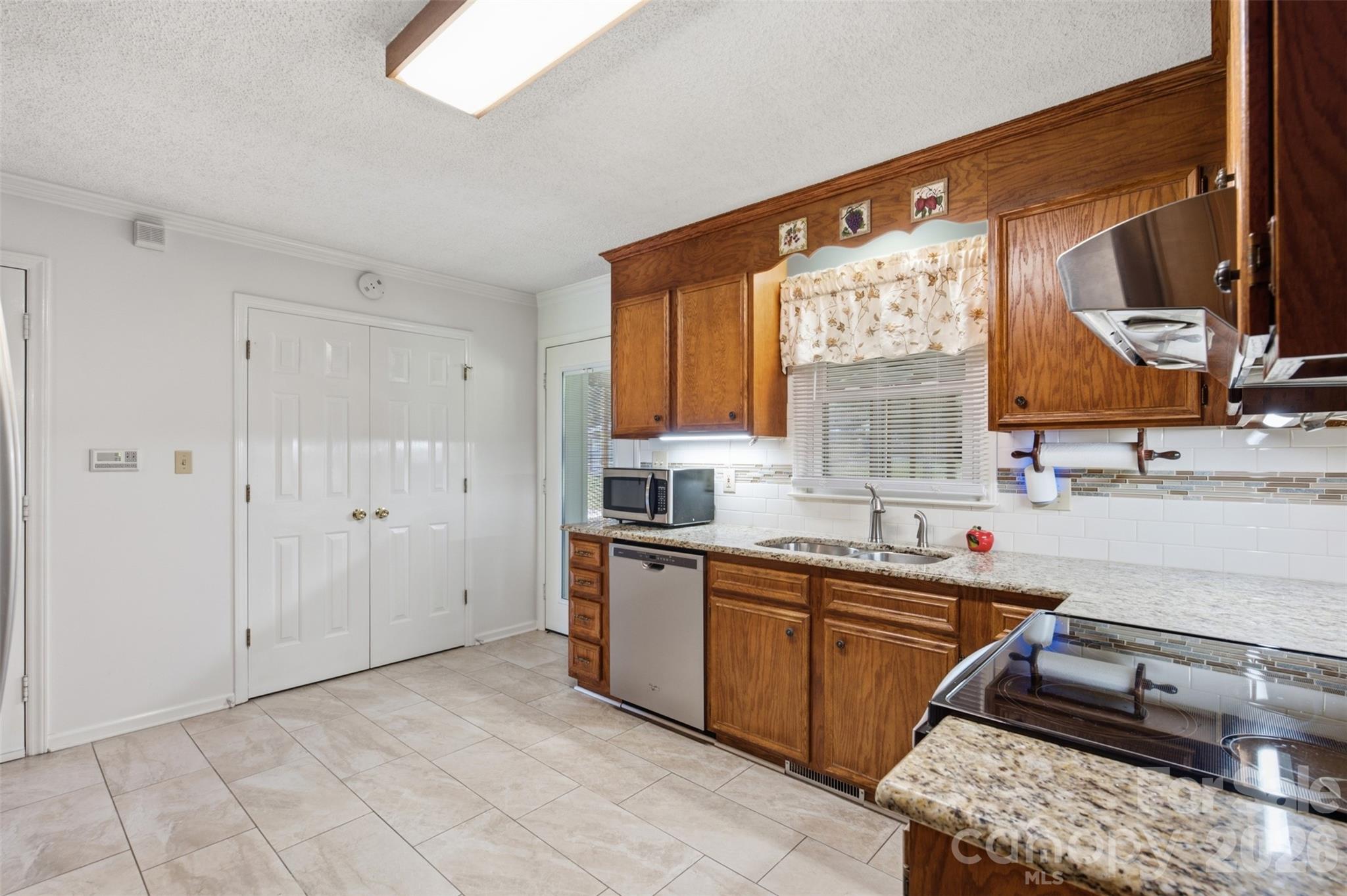 There is a sunroom outside that door. - 118 Sherwood Drive, Taylorsville
