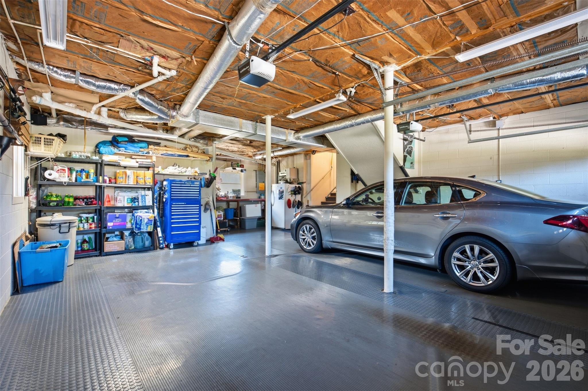 Crawl space in garage in this well maintained home. - 118 Sherwood Drive, Taylorsville