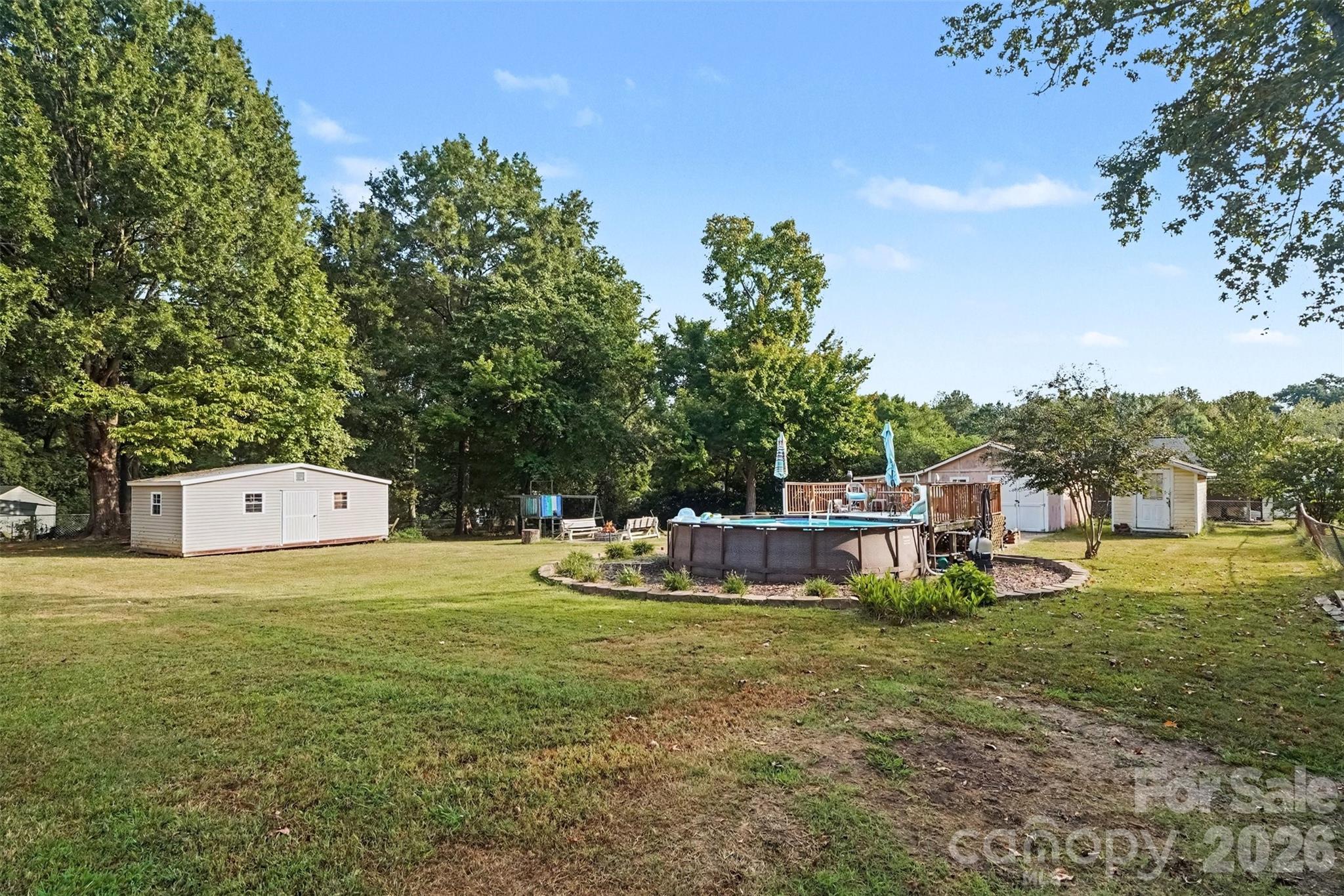 shed in photo to the left is not included - 15229 Comanche Lane, Matthews