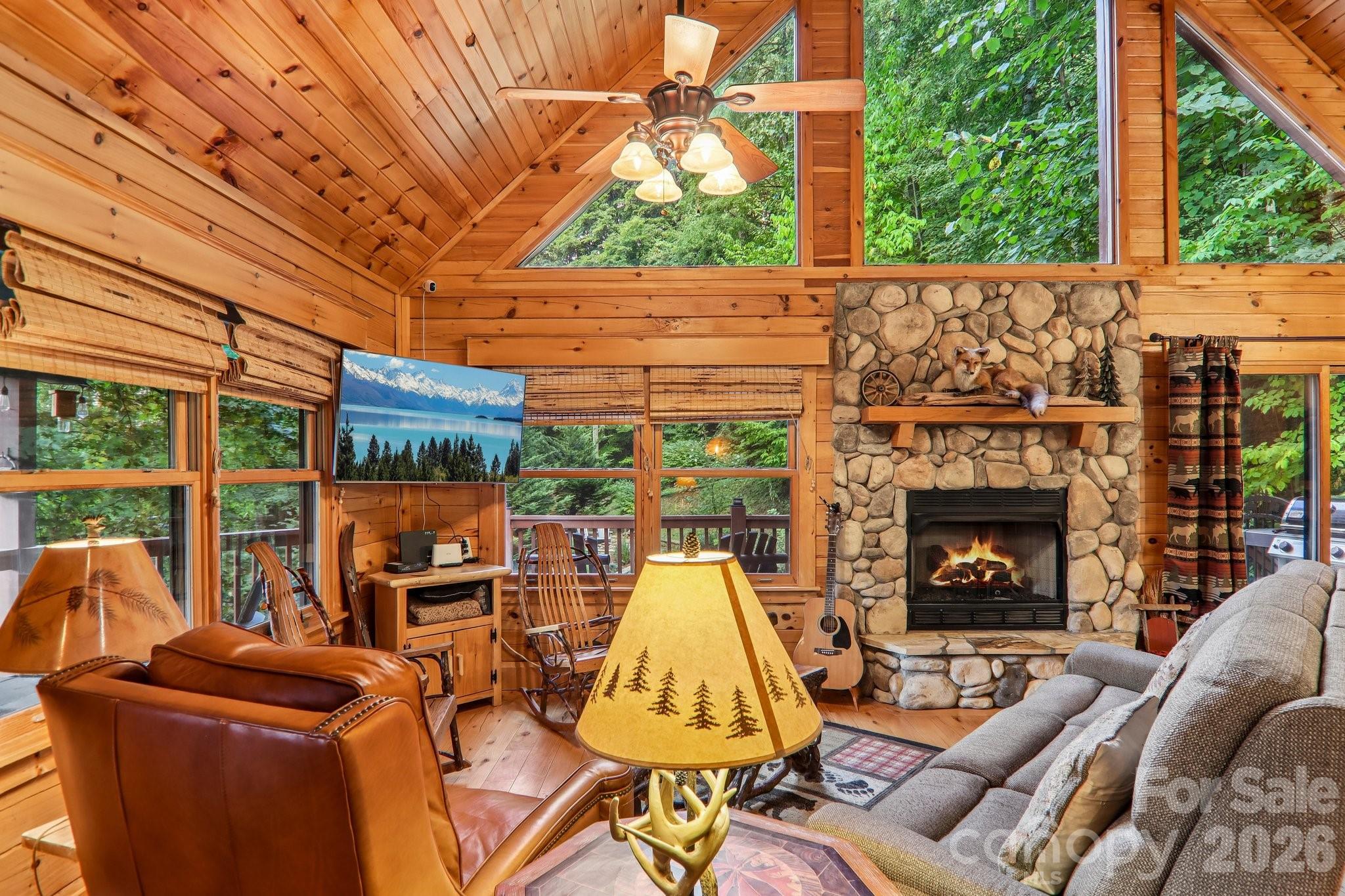 Fireplace is the center of the home - 230 Forest Drive, Maggie Valley