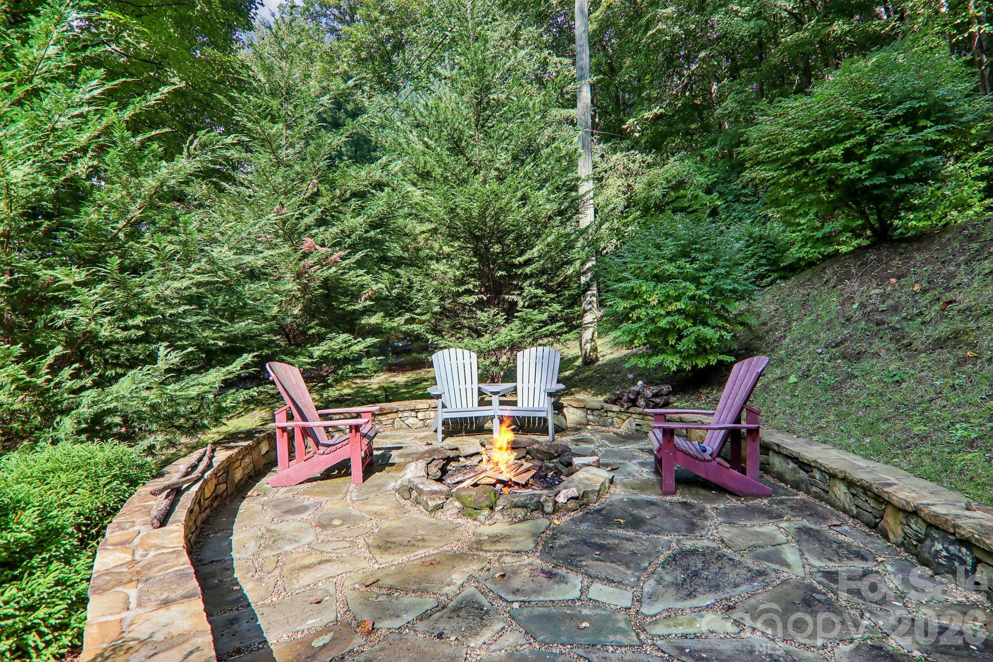 Stone pavers for the firepit seating area - 230 Forest Drive, Maggie Valley