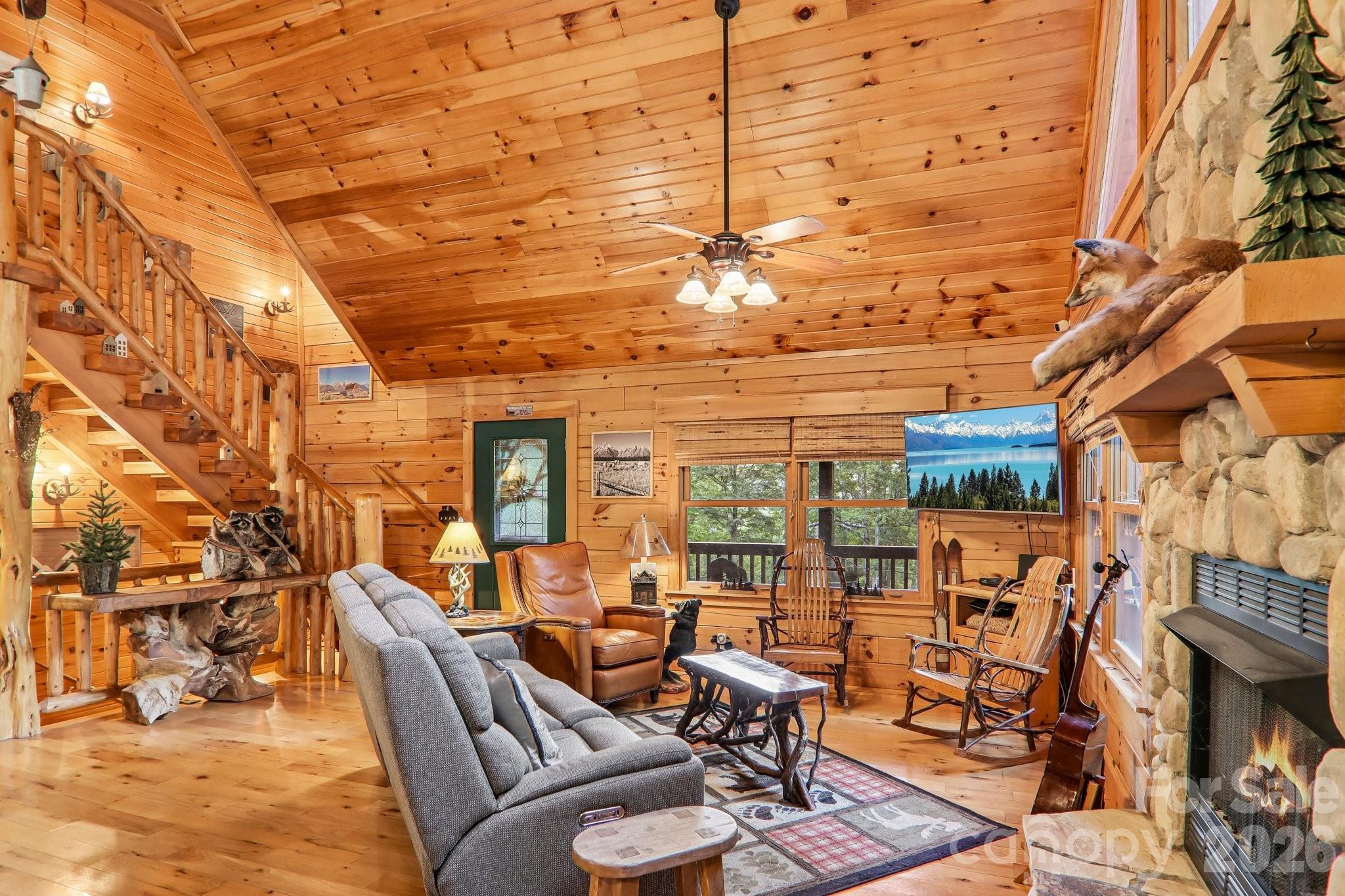 large seating area with TV and fireplace. - 230 Forest Drive, Maggie Valley