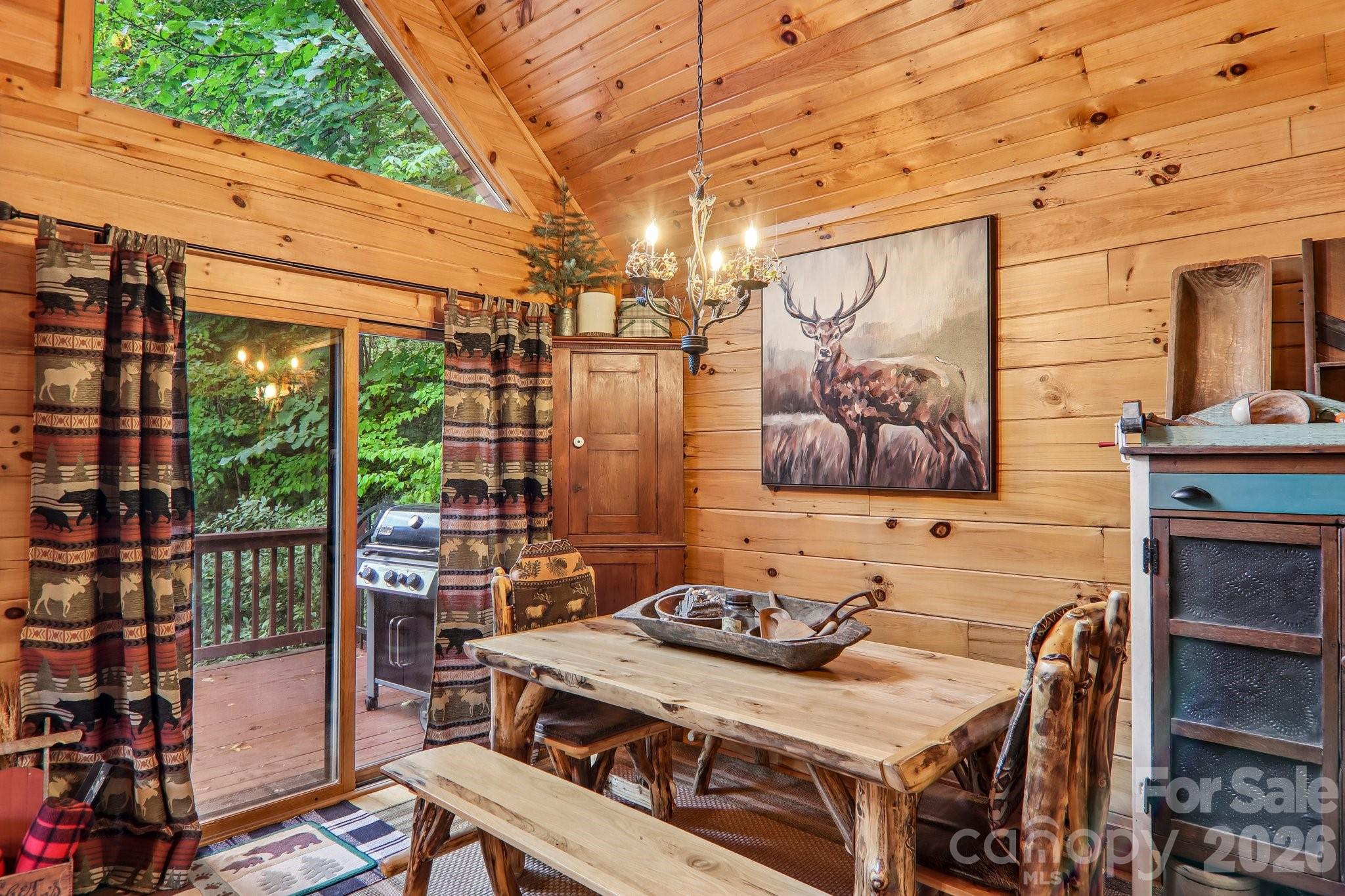 Dining area with big doors - 230 Forest Drive, Maggie Valley