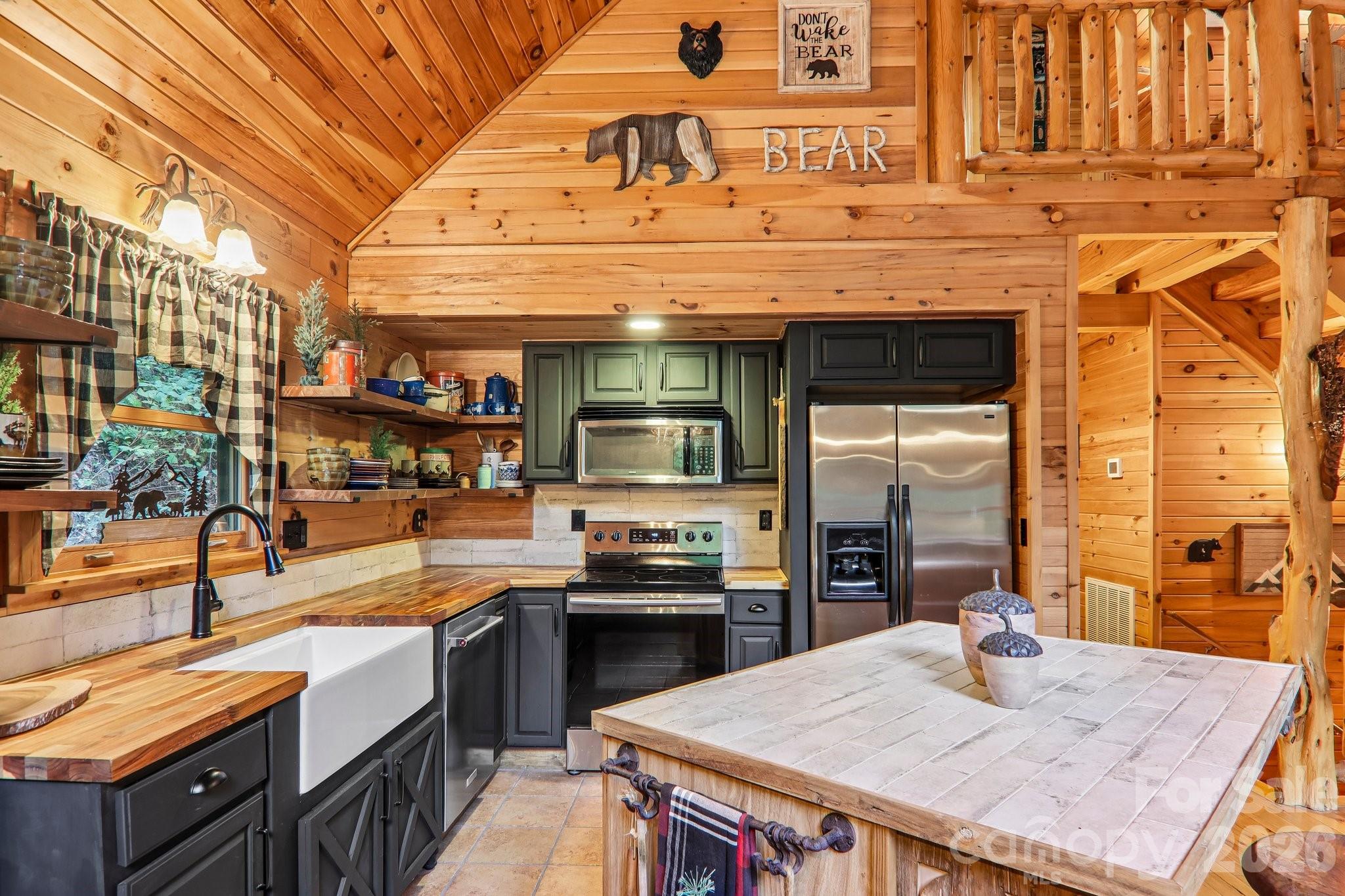 Well designed kitchen - open shelves - farm sink - 230 Forest Drive, Maggie Valley