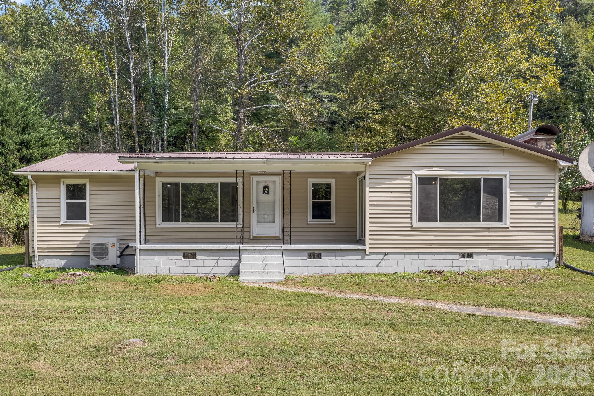 Single Family Residence at 4078 NC 208 Highway, Marshall, photo 2 of 39