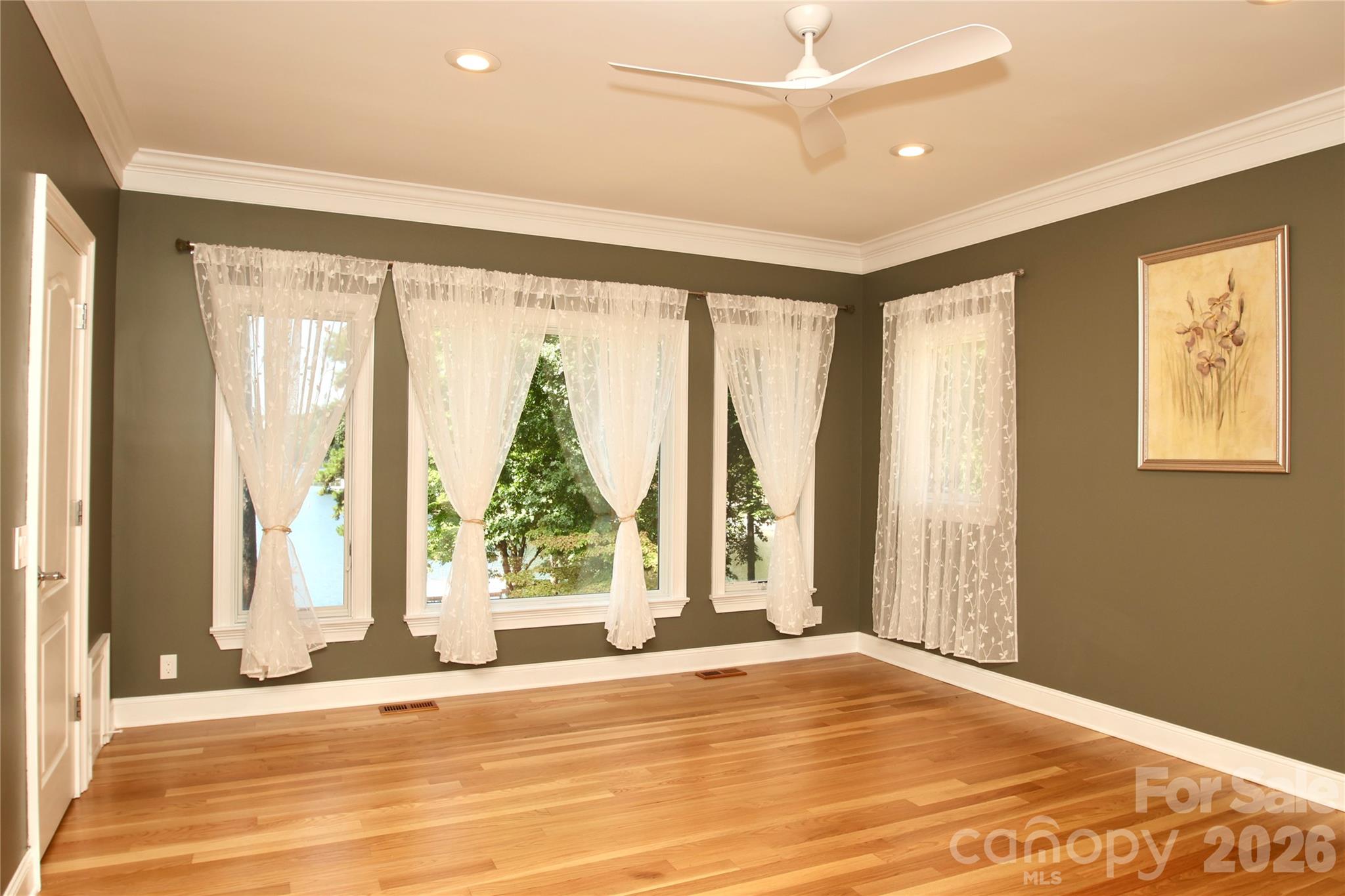 Primary bedroom with picturesque views of LKN! - 140 Holt Lane, Mooresville