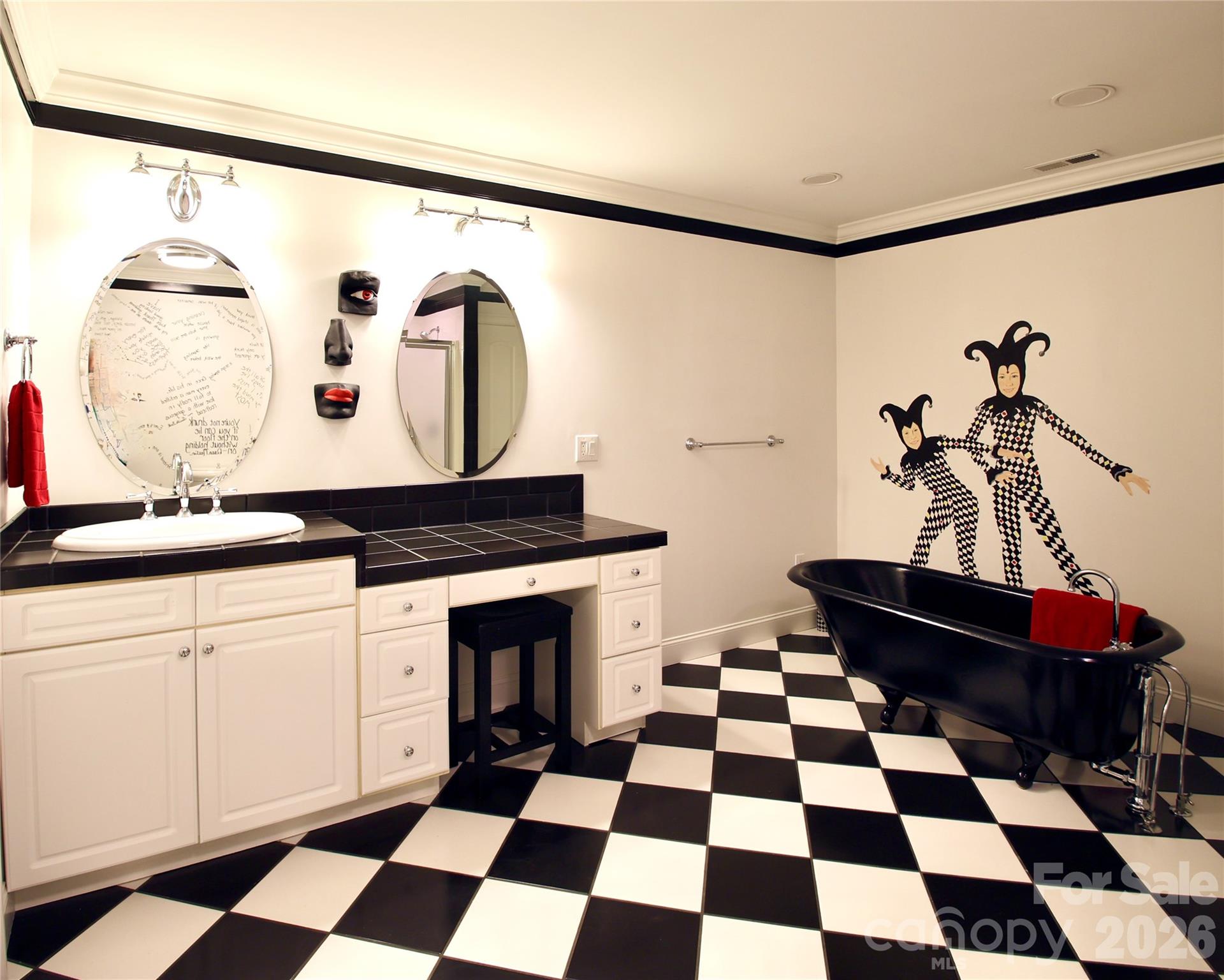 Bathroom has sink, toilet, shower but this black claw-foot tub does not convey as it is a family heirloom. - 140 Holt Lane, Mooresville