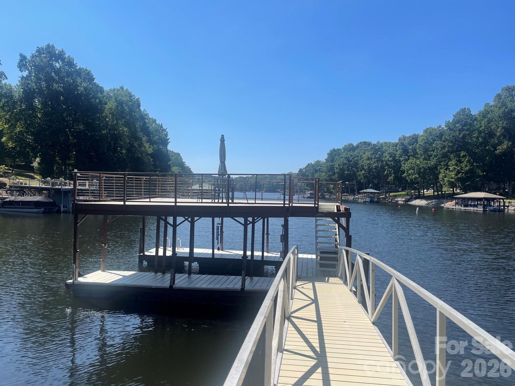 Double-decker docks are a great find on LKN when you can find one! Room to park your boat underneath and on the sides and end if need be! Water is deep year-round even in the worst droughts of '08 and '26. - 140 Holt Lane, Mooresville
