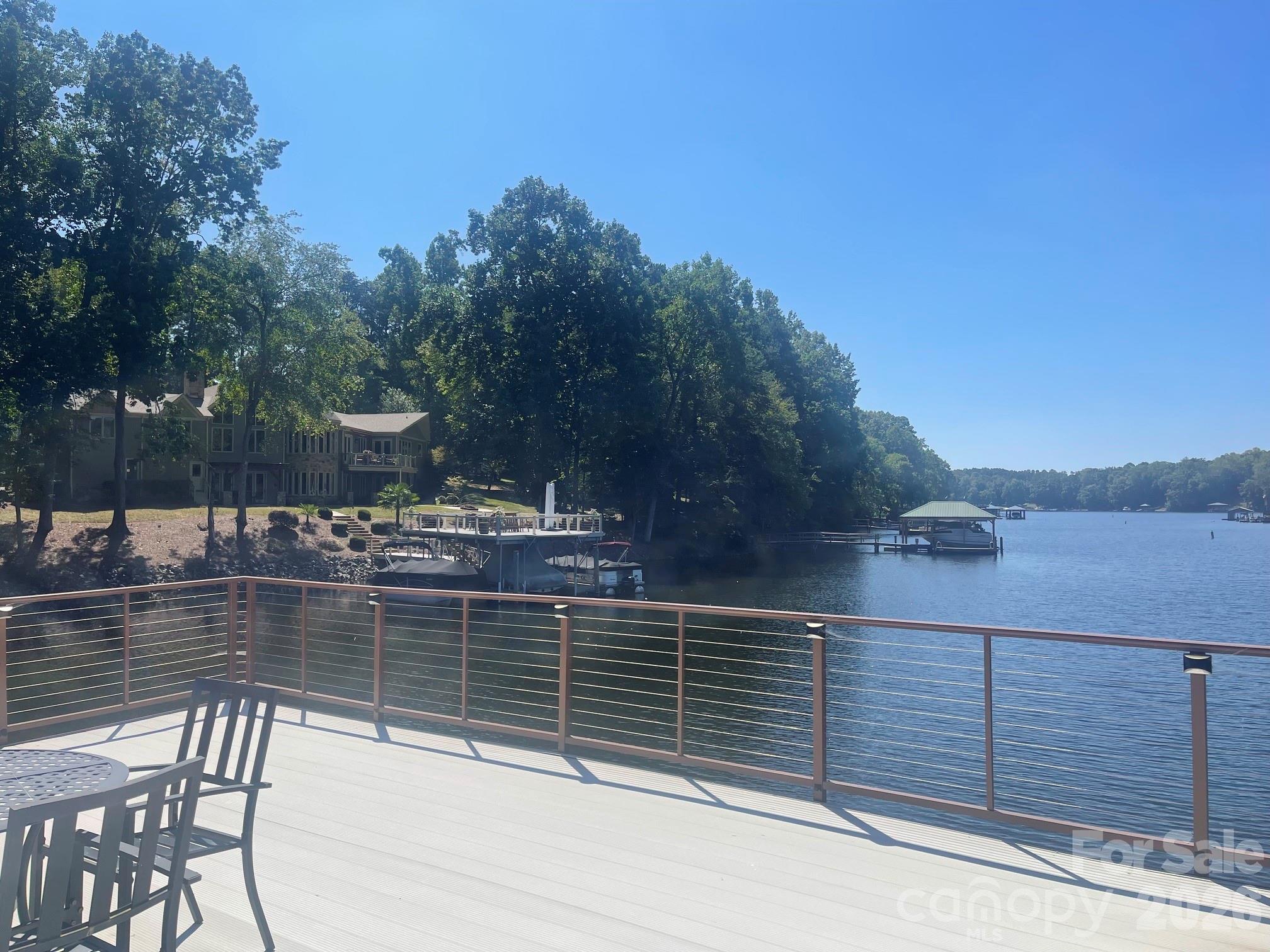 Aluminum decking and posts with cable railing so you can sit and enjoy your expansive views. - 140 Holt Lane, Mooresville
