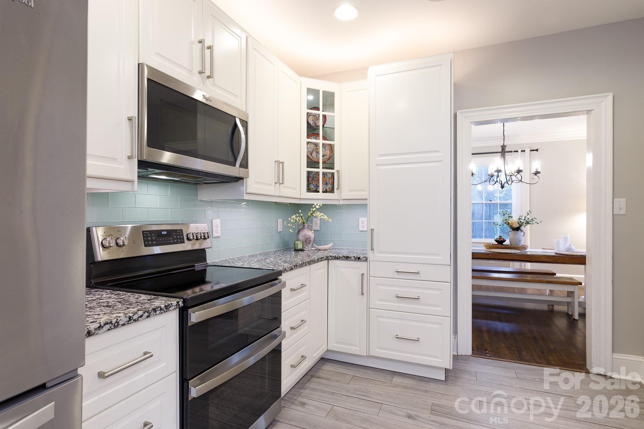 Kitchen next to dining room - 411 Dale Avenue, Gastonia