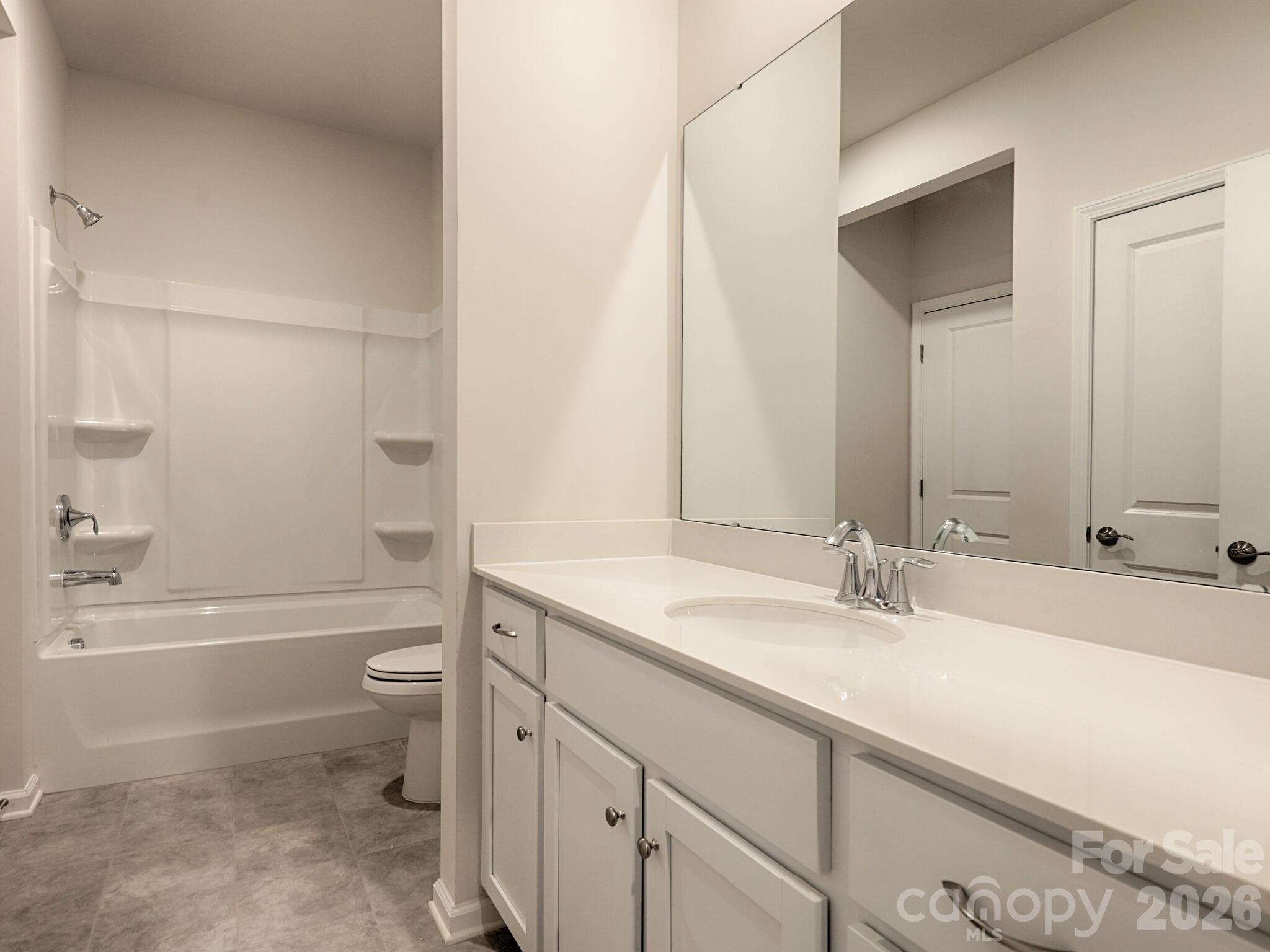 Vanity has marble countertop - 121 Olive Tea Lane, Statesville