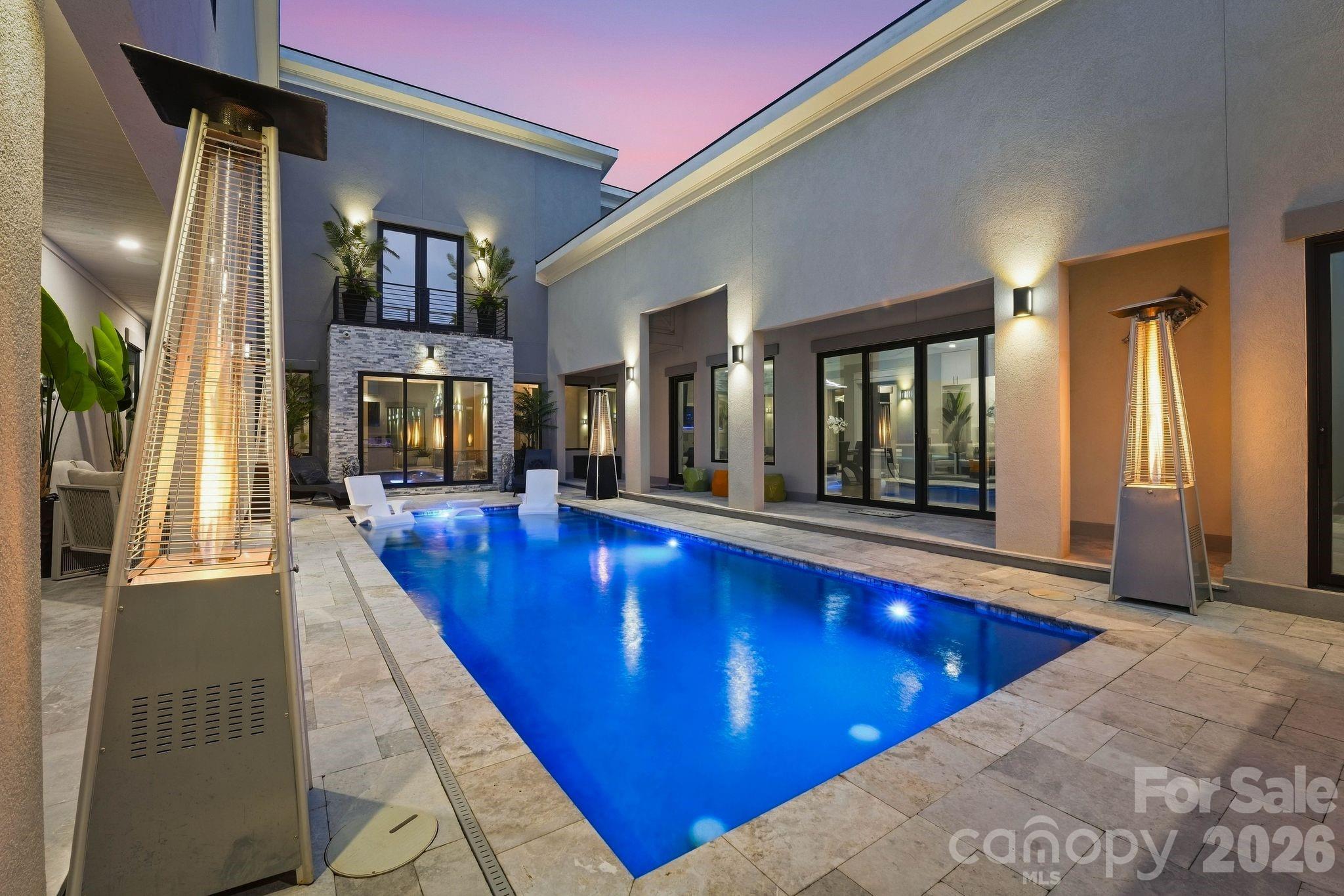 Premium lighting/lunar features, Surround Sound, Outdoor BBQ area, Grill, Flat-top cooker, 85-inch TV - 15700 Youngblood Road, Charlotte