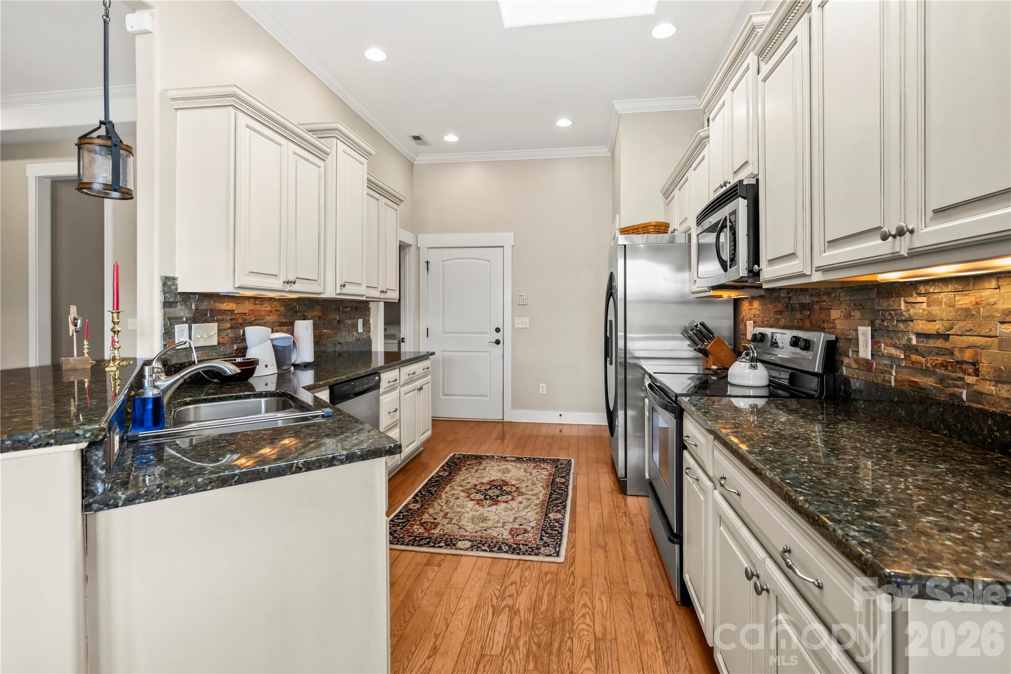 Single Family Residence at 27 Dreambird Drive, Leicester, photo 8 of 34