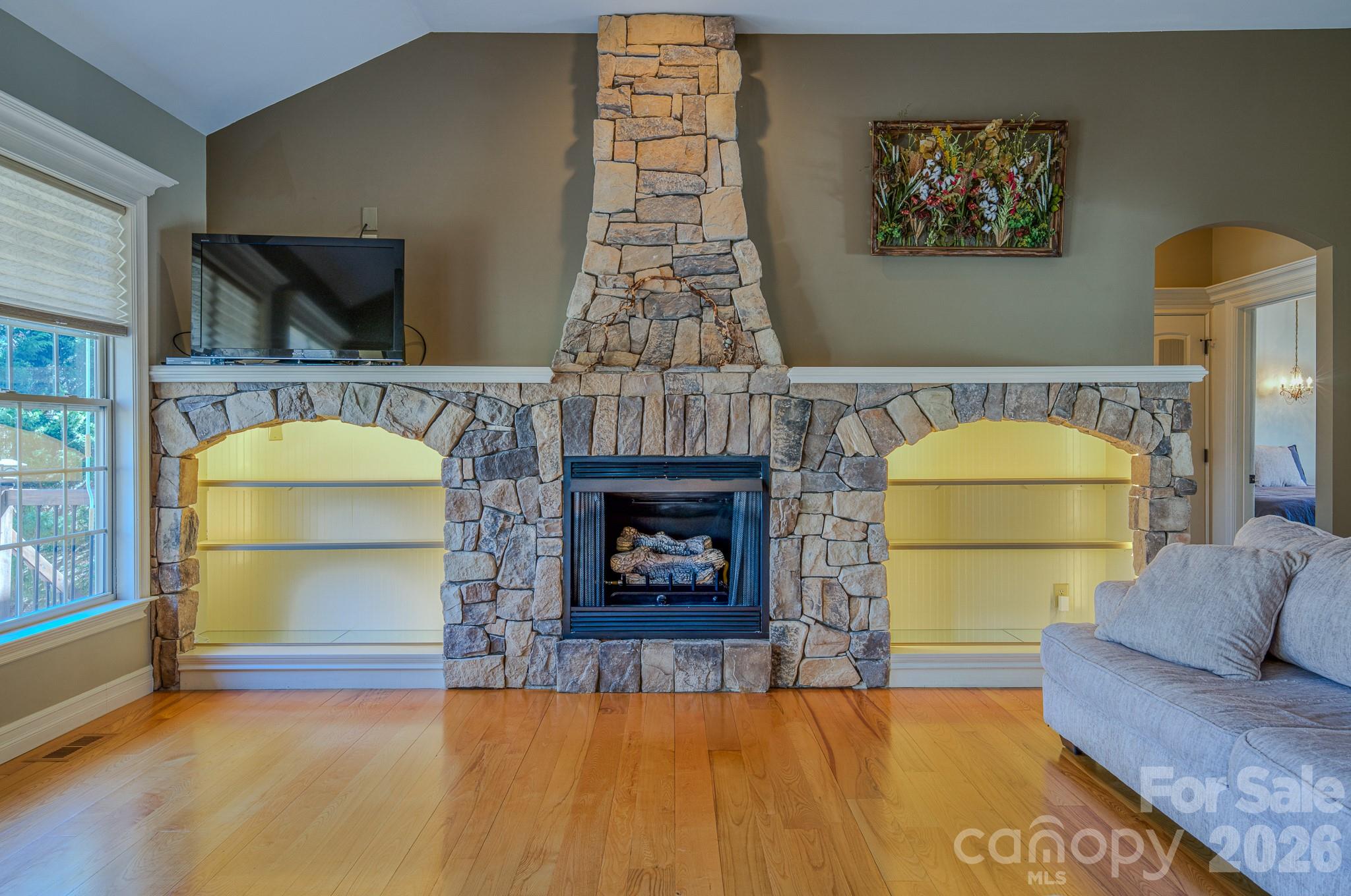 Built-ins and fireplace in living room - 3975 Plantation Drive, Morganton
