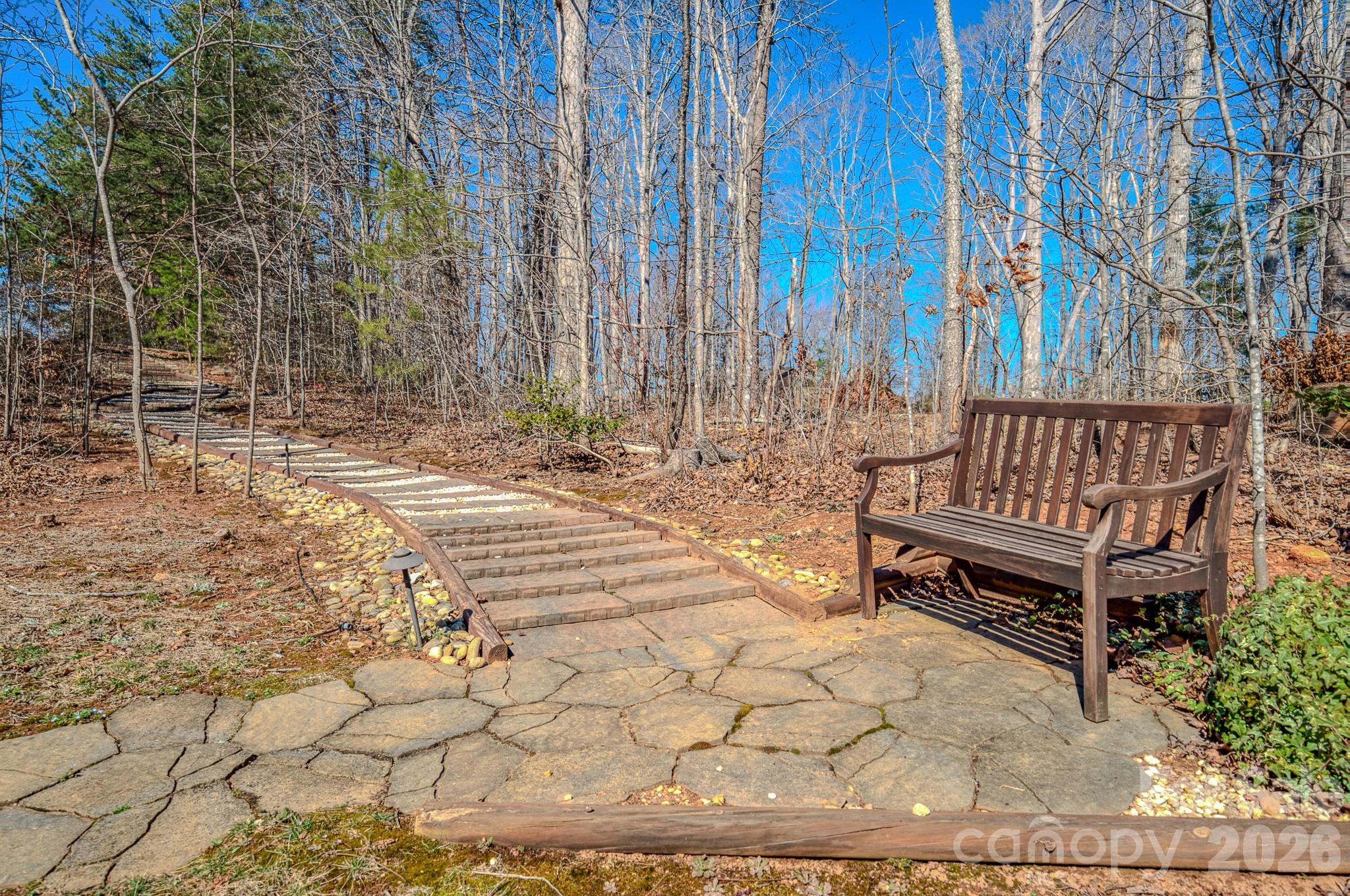 walkway with bench - 3975 Plantation Drive, Morganton