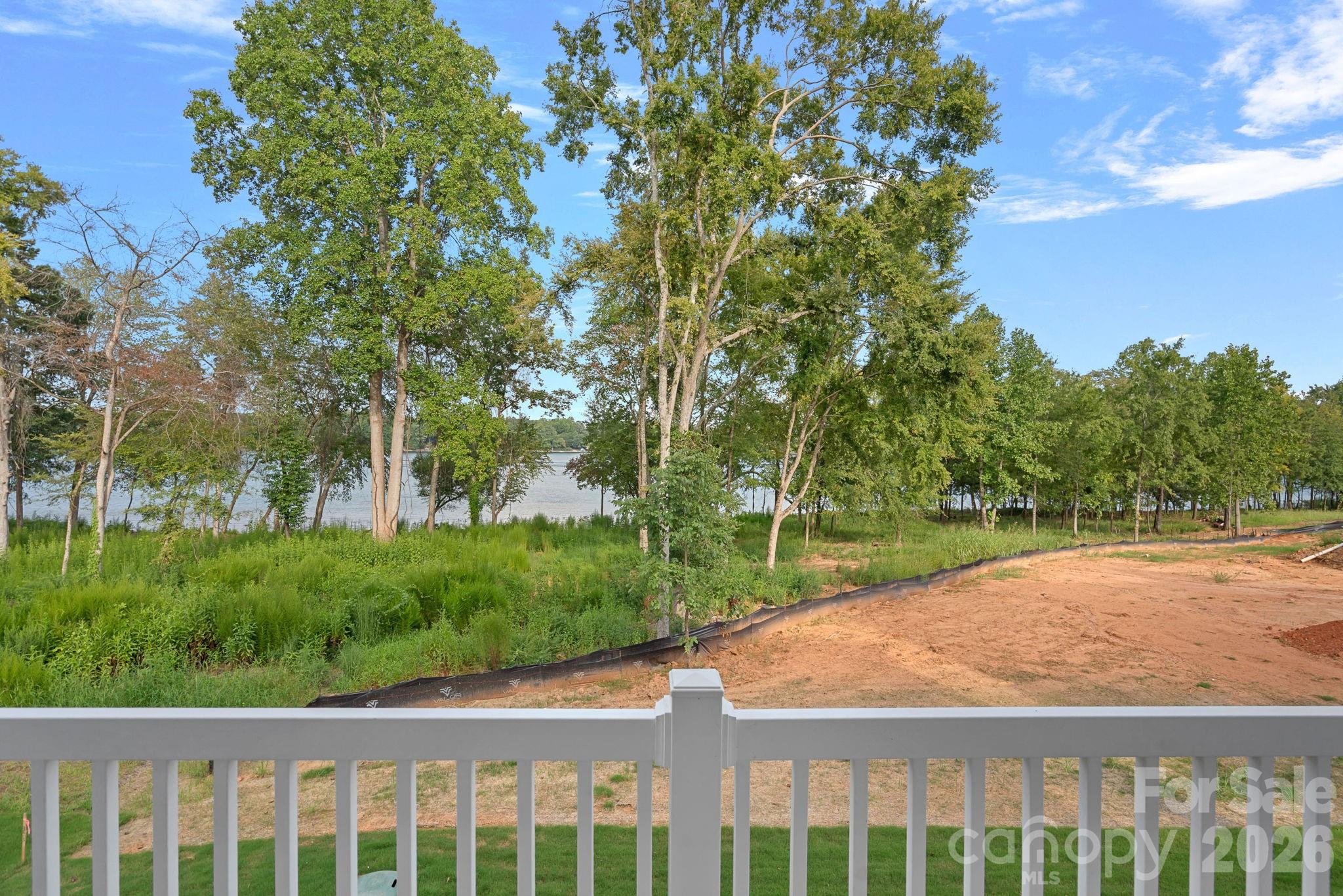 Lake views from the main-level deck, accessed from the Great Room/Kitchen. The landscape will be green before you know it! - 4477 Splash Trail, Sherrills Ford