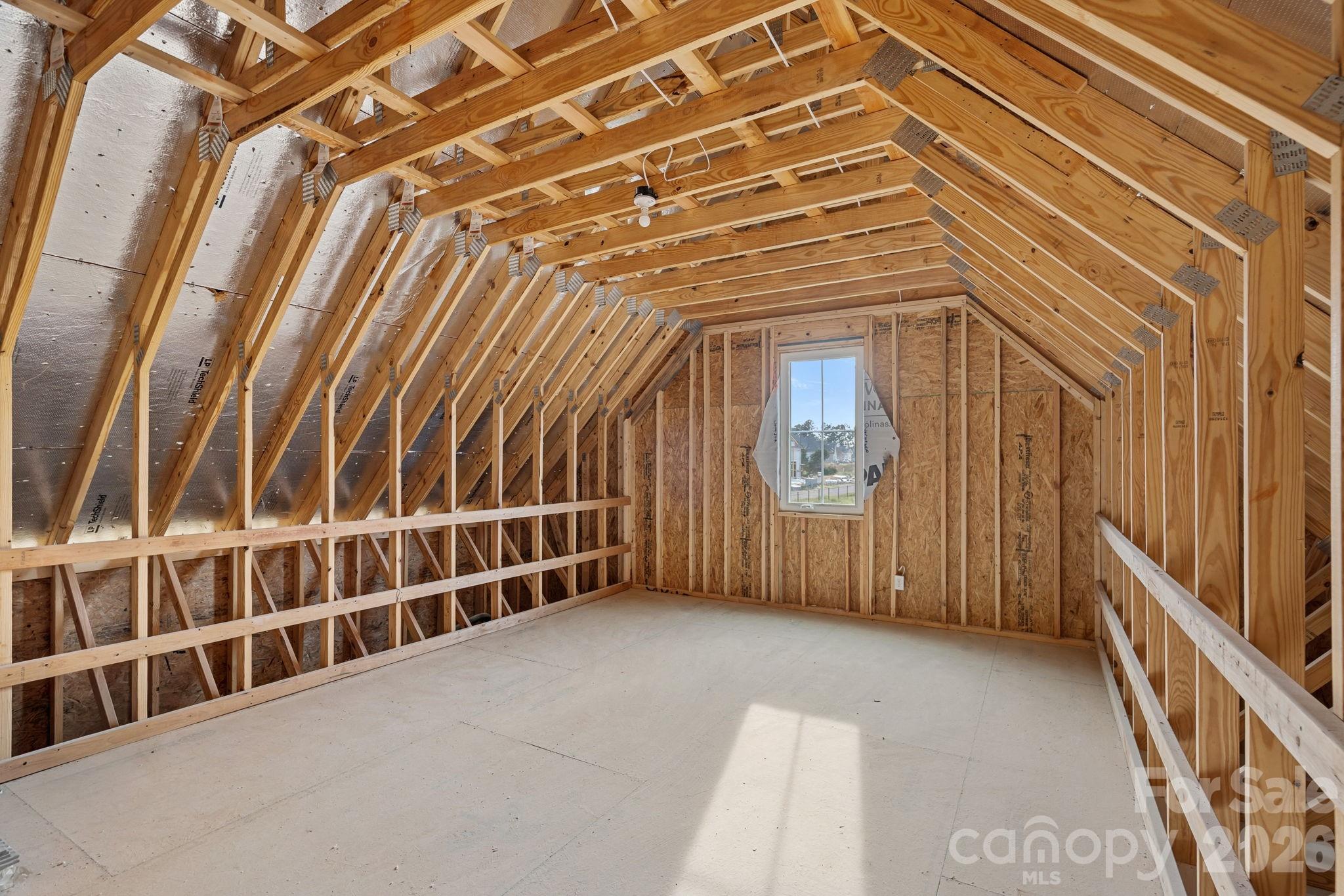 Upper-level attic space for your extras, or finish and add value down the road! - 4477 Splash Trail, Sherrills Ford