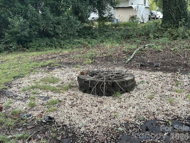Firepit in Rear Yard - 206 Pethel Street, Kannapolis