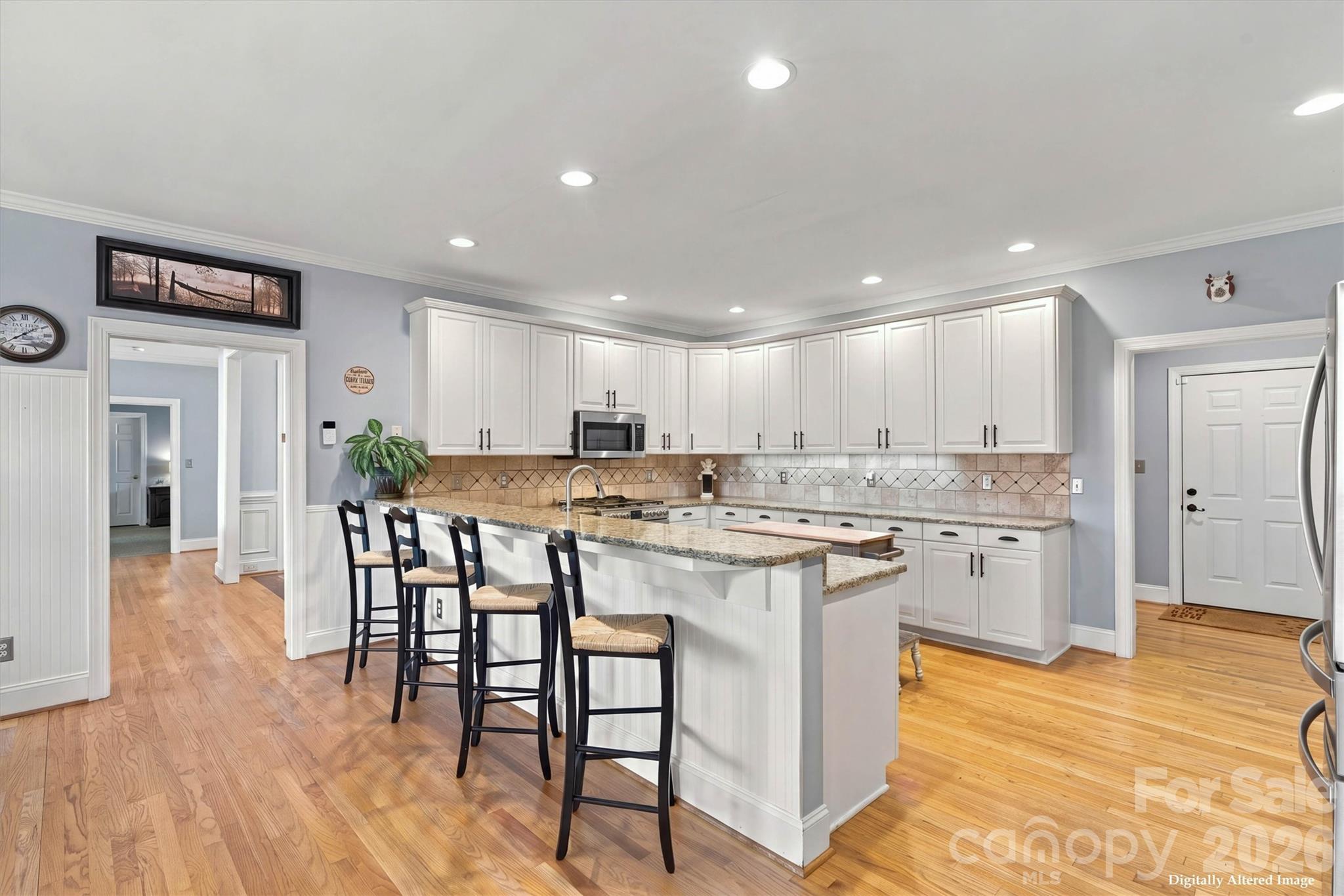 Virtually Enhanced with White Cabinets - 1733 Verdict Ridge Drive, Denver