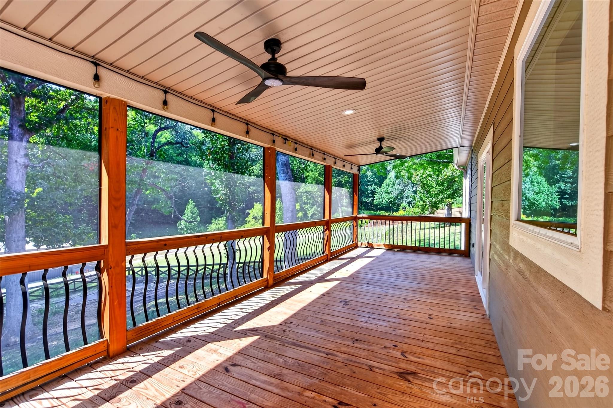 enjoy the breeze on an expansive screened-in porch - 131 Ridge Road, Candler