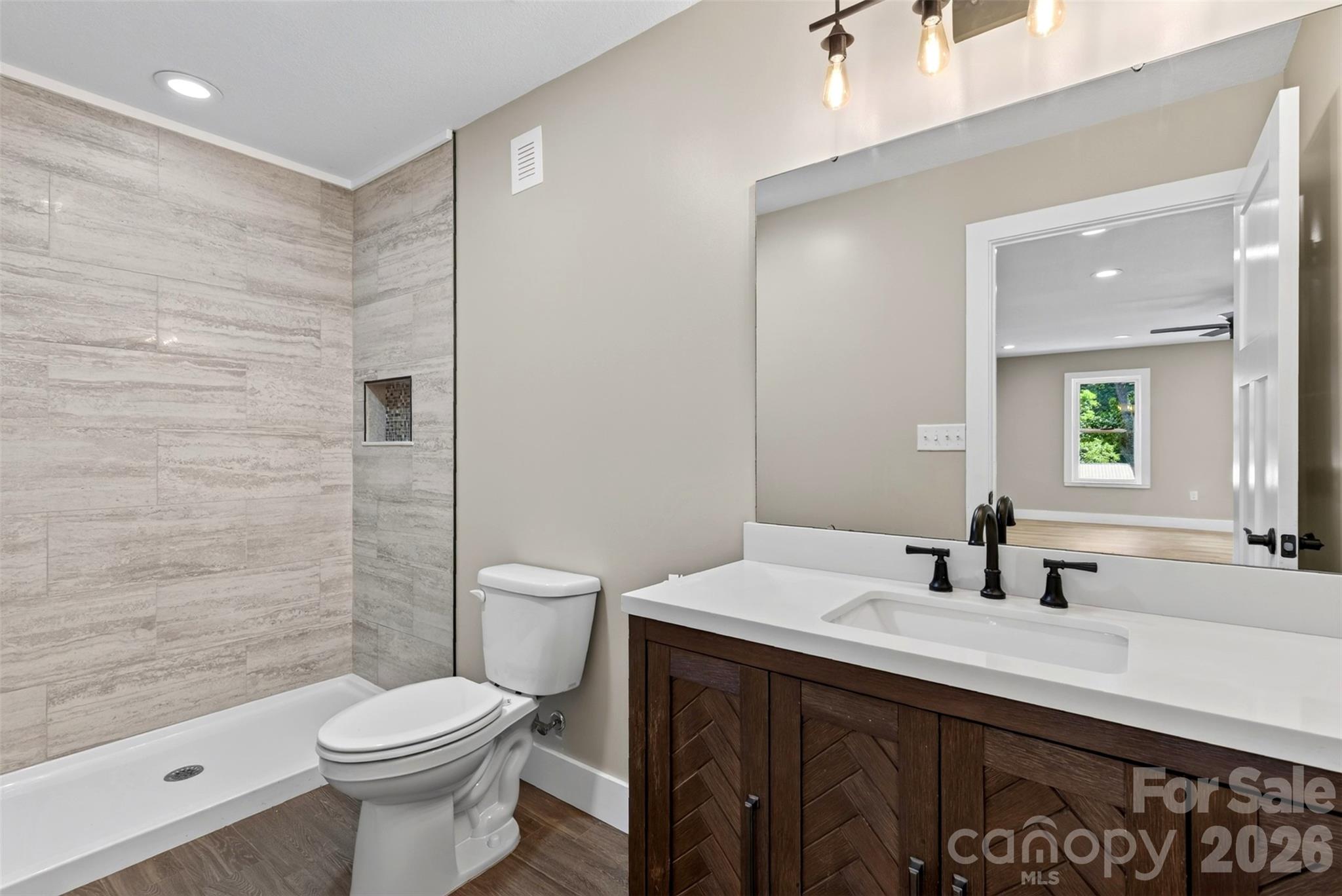 downstairs guest bathroom - 131 Ridge Road, Candler