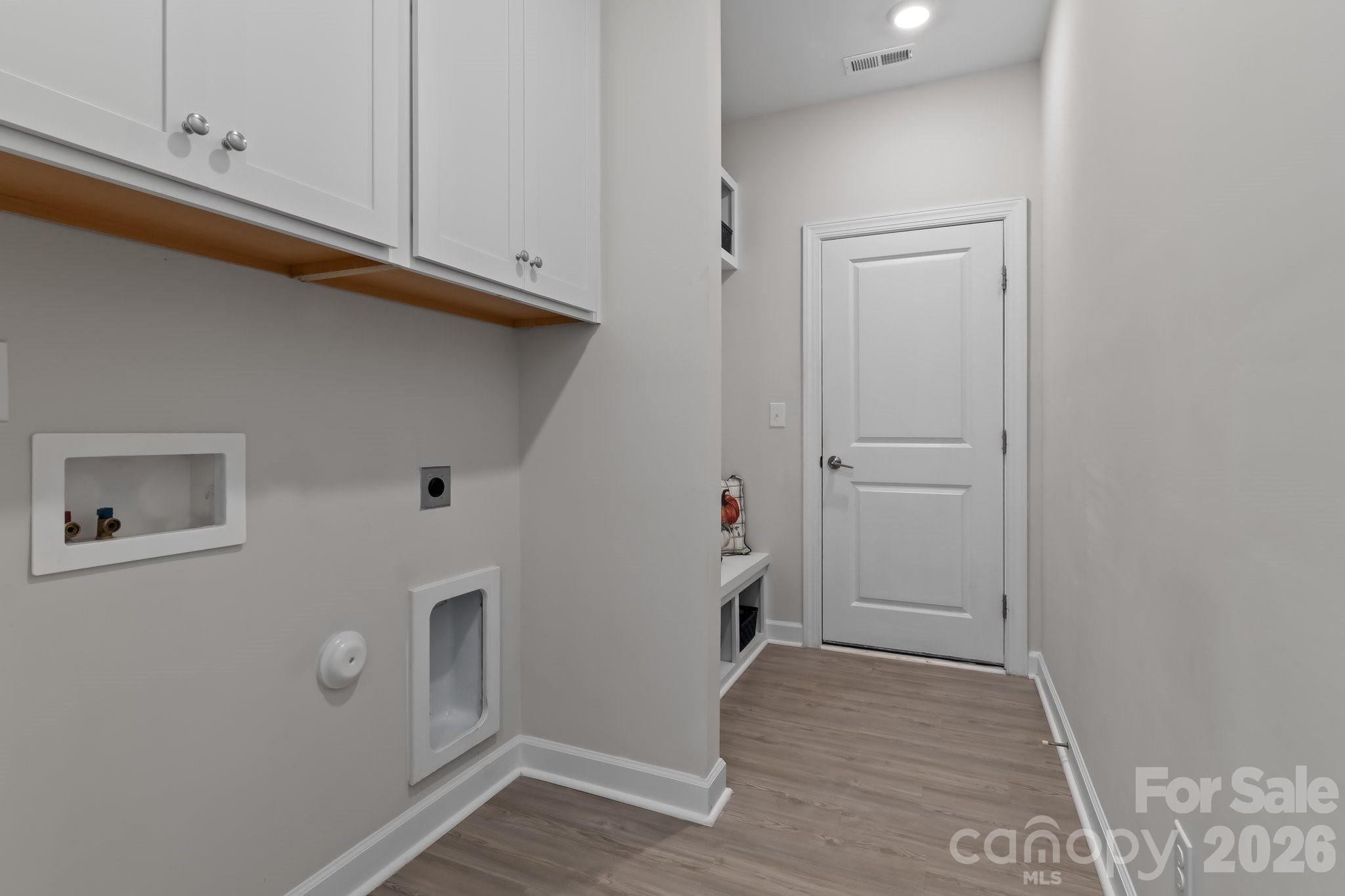 laundry hookup and drop zone; looking toward garage door - 916 Westminster Drive, Statesville
