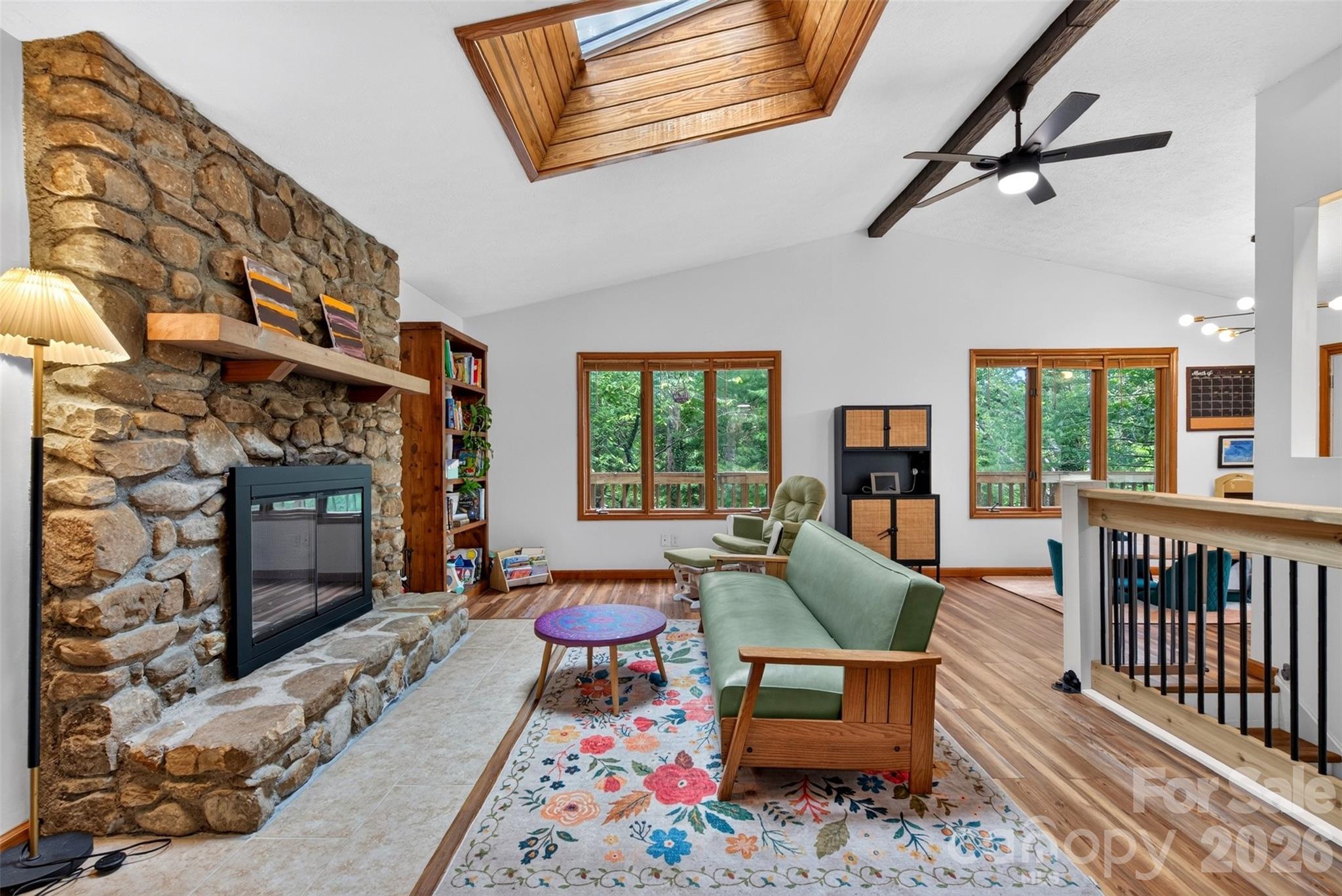 Abundant natural light with a wood-burning fireplace - 39 Spooks Branch Extension, Asheville