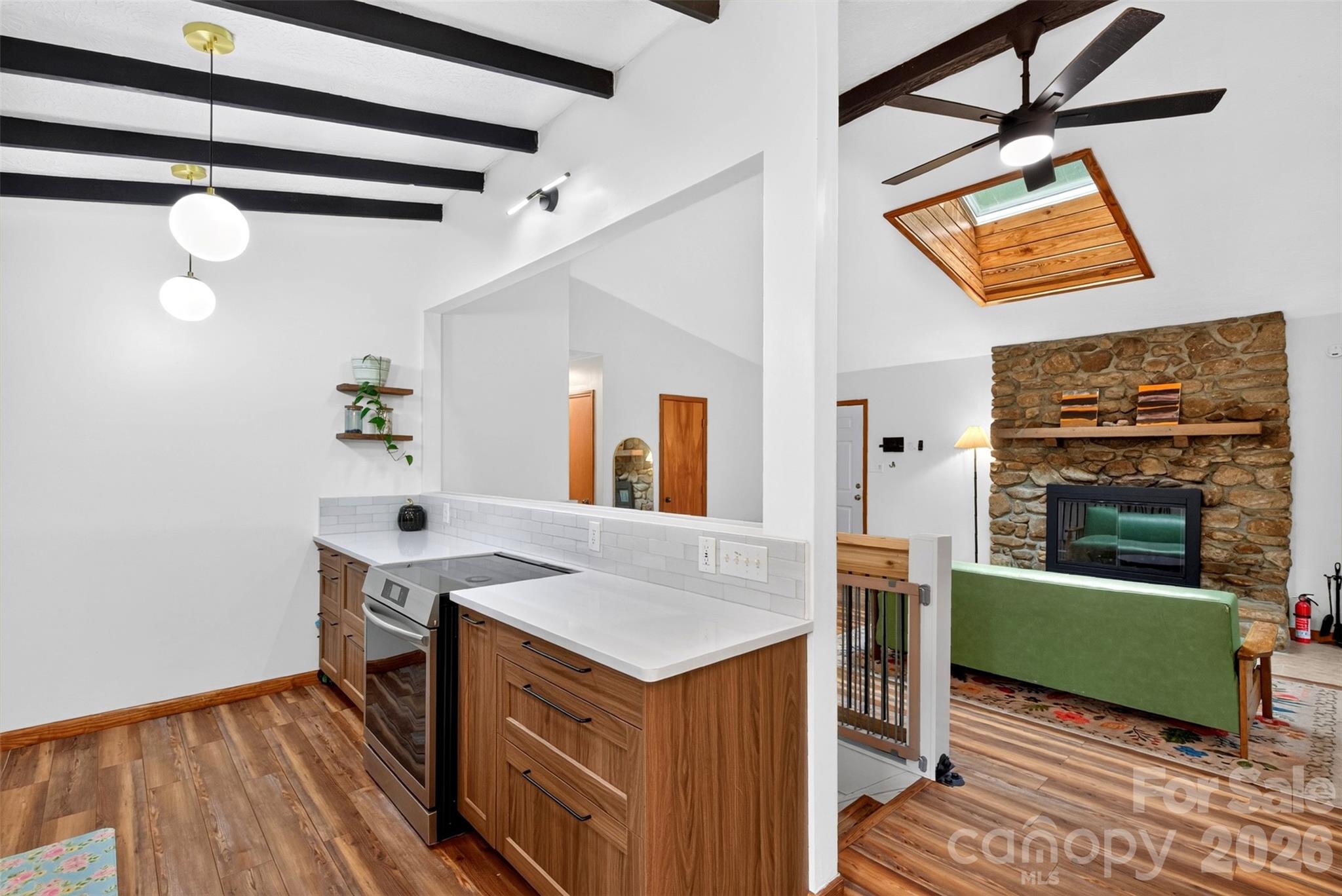 Updated kitchen flows effortlessly - 39 Spooks Branch Extension, Asheville