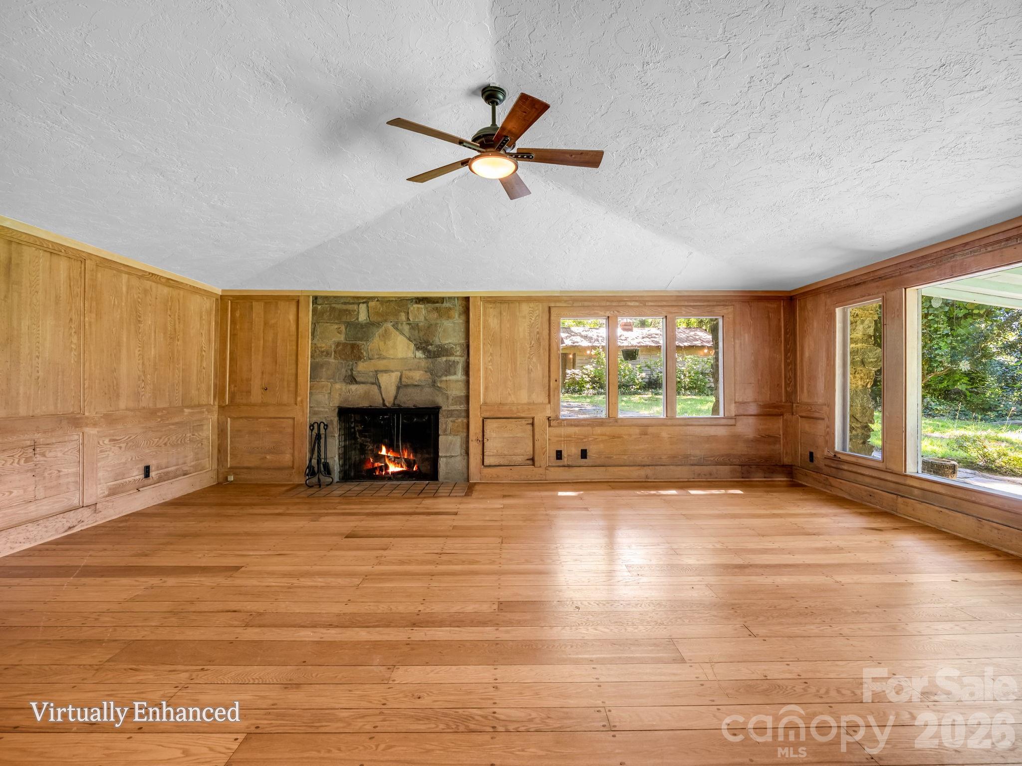 Living room with wood burning fireplace - 145 Stone Hedge Lane, Tryon