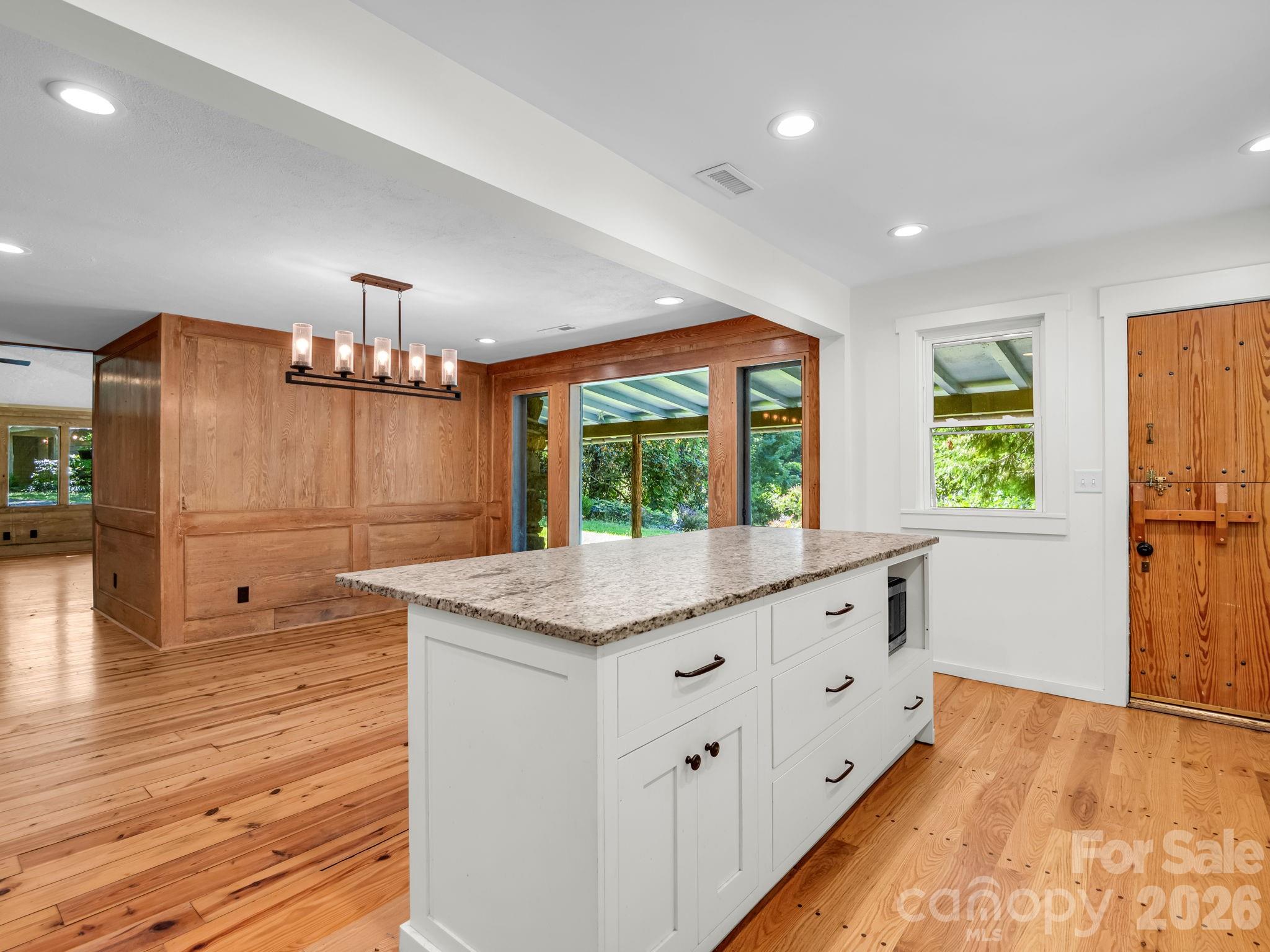 Breakfast bar with solid surface counter top - 145 Stone Hedge Lane, Tryon