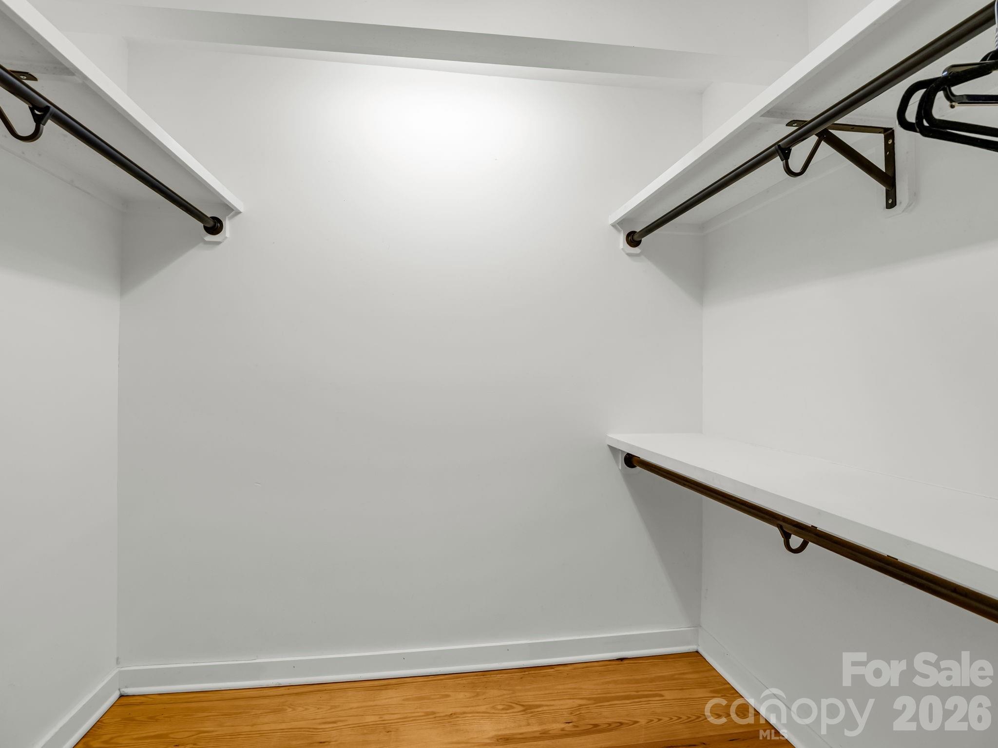 Primary bedroom walk-in closet - 145 Stone Hedge Lane, Tryon
