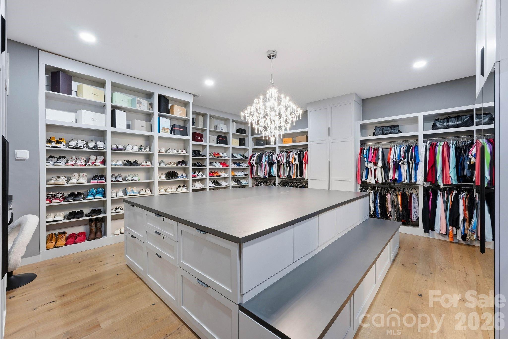 Owner's Suite Closet with Custom Sliding Built-ins - 15700 Youngblood Road, Charlotte
