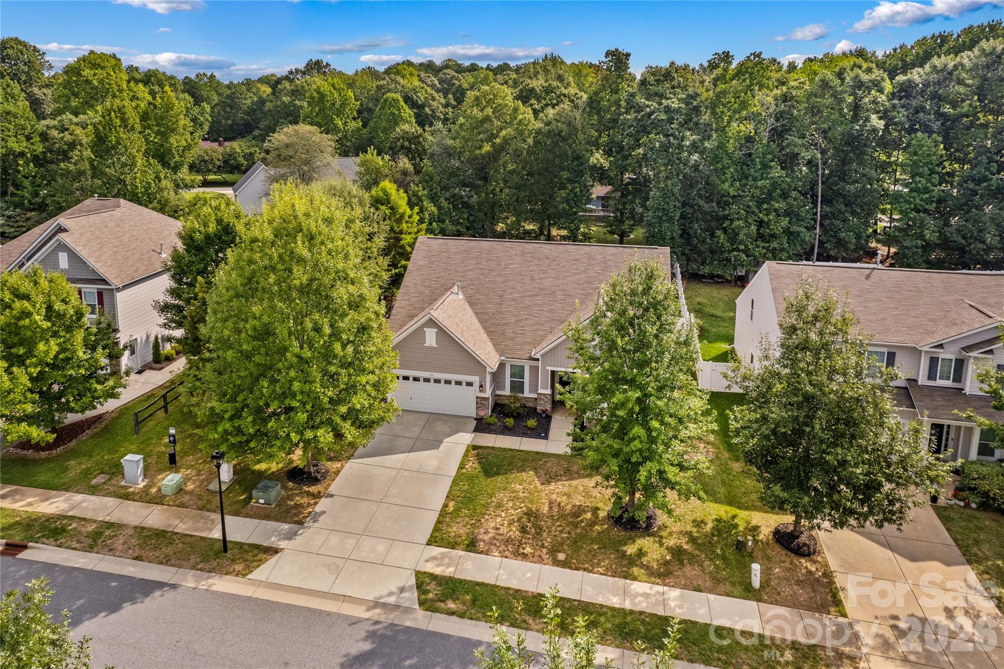 Lovely Streetscape with a fringe of trees and sidewalk - 111 Paradise Hills Circle, Mooresville