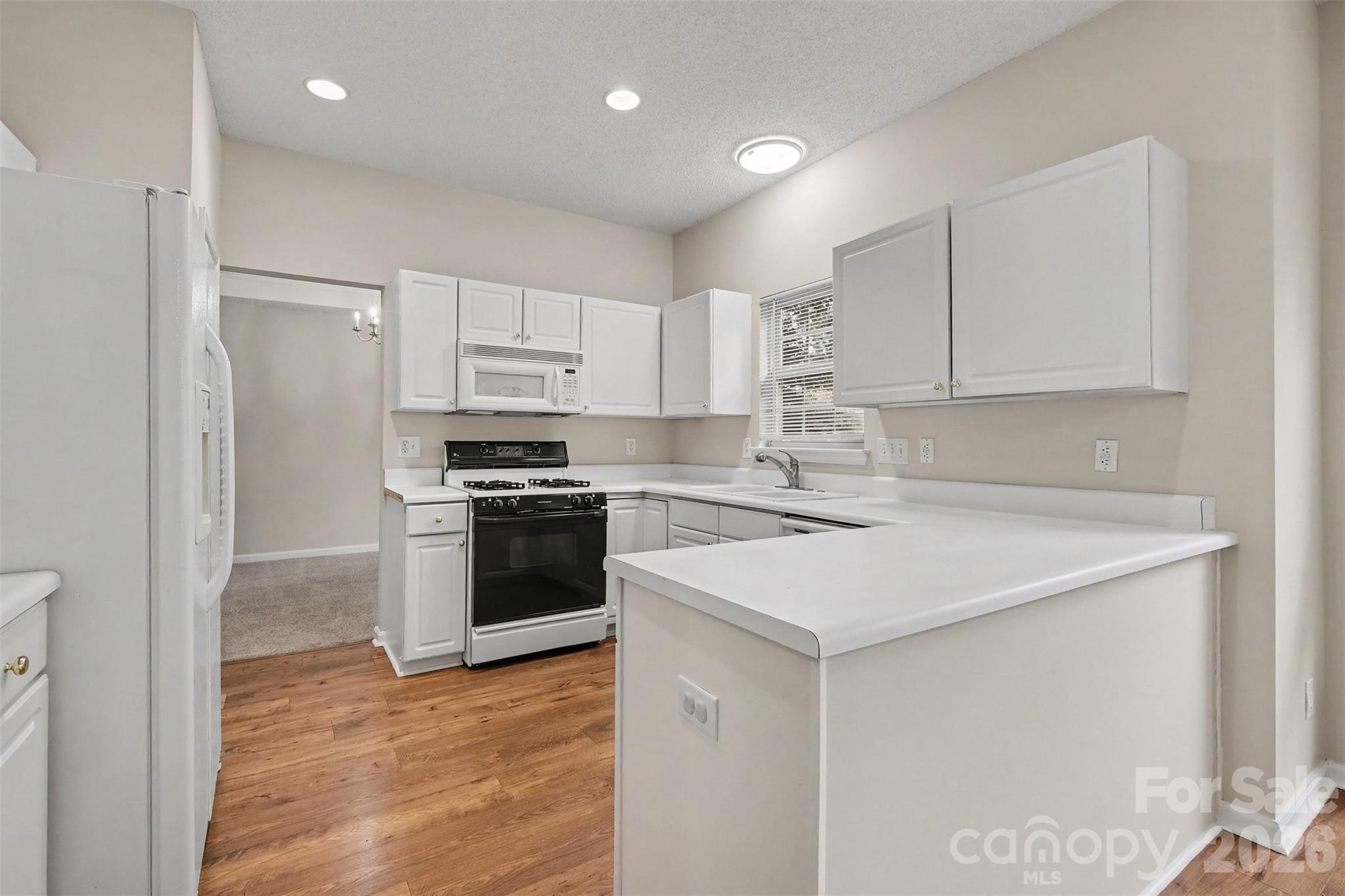 Single Family Residence at 4153 Griswell Drive NW, Concord, photo 8 of 28