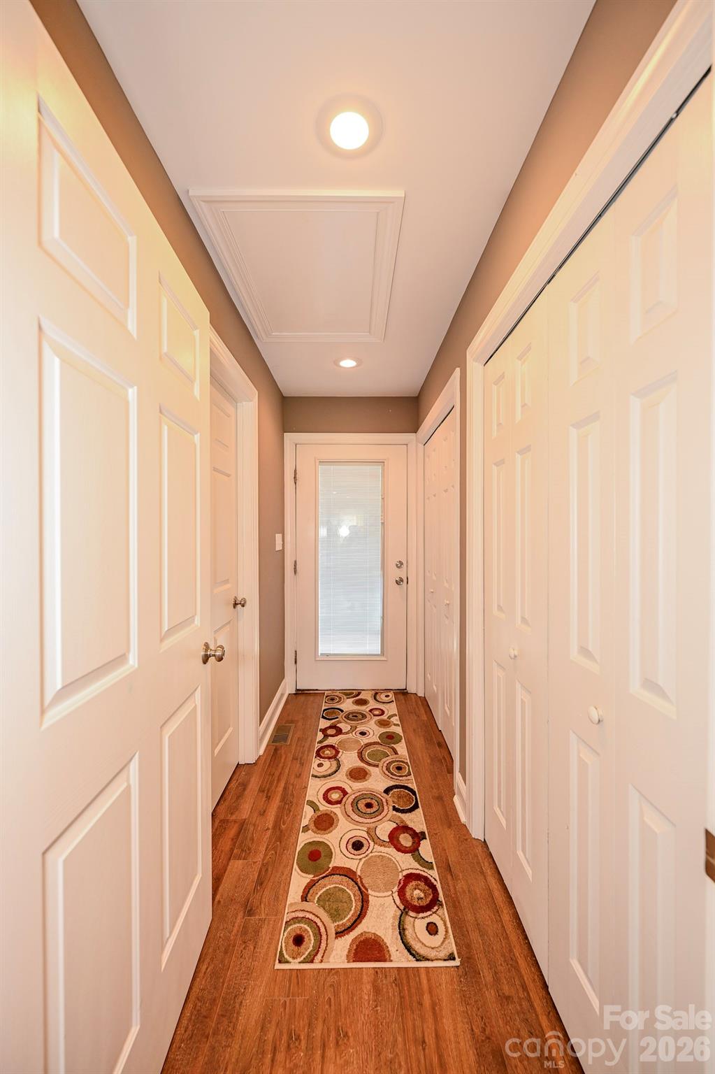 Hallway from patio leading to Laundry room and storage closets - 5526 Old Kennedy Ford Road, Marshville