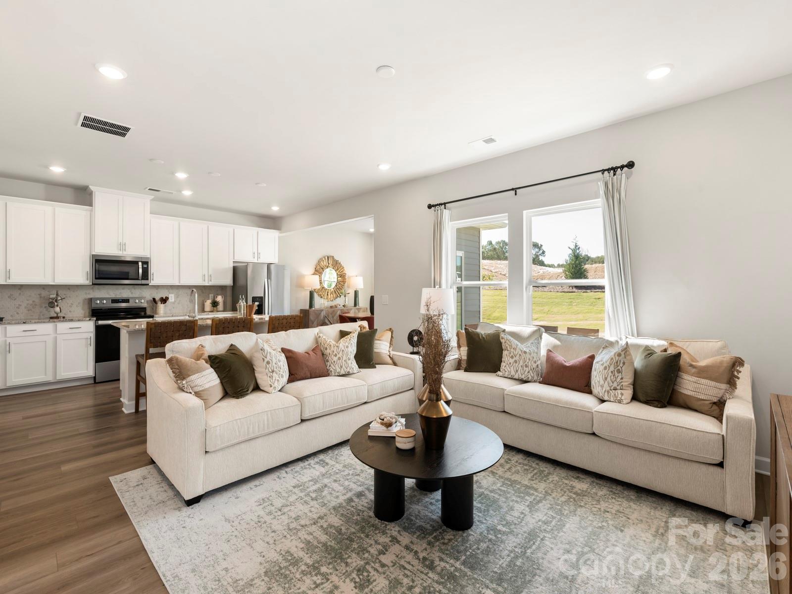 Photo is not of the actual home, but is an inspirational photo of builder’s model home and may depict options, furnishings, and/or decorator features that are not included - 12644 Russellwood Lane, Charlotte