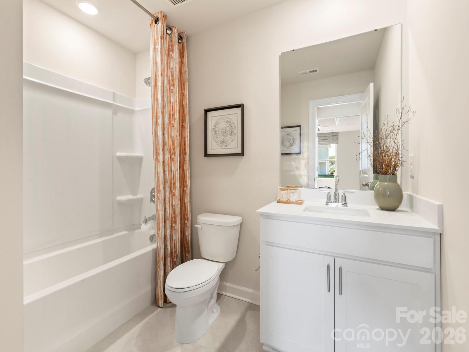 Photo is not of the actual home, but is an inspirational photo of builder’s model home and may depict options, furnishings, and/or decorator features that are not included - 12644 Russellwood Lane, Charlotte