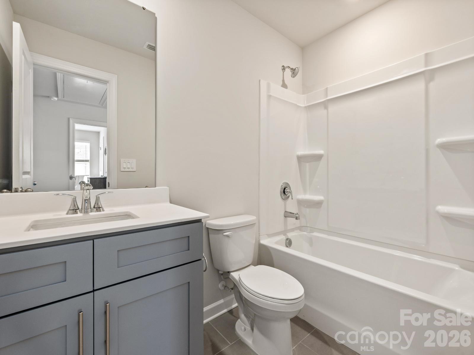 Photo is not of the actual home, but is an inspirational photo of builder’s model home and may depict options, furnishings, and/or decorator features that are not included - 12640 Russellwood Lane, Charlotte
